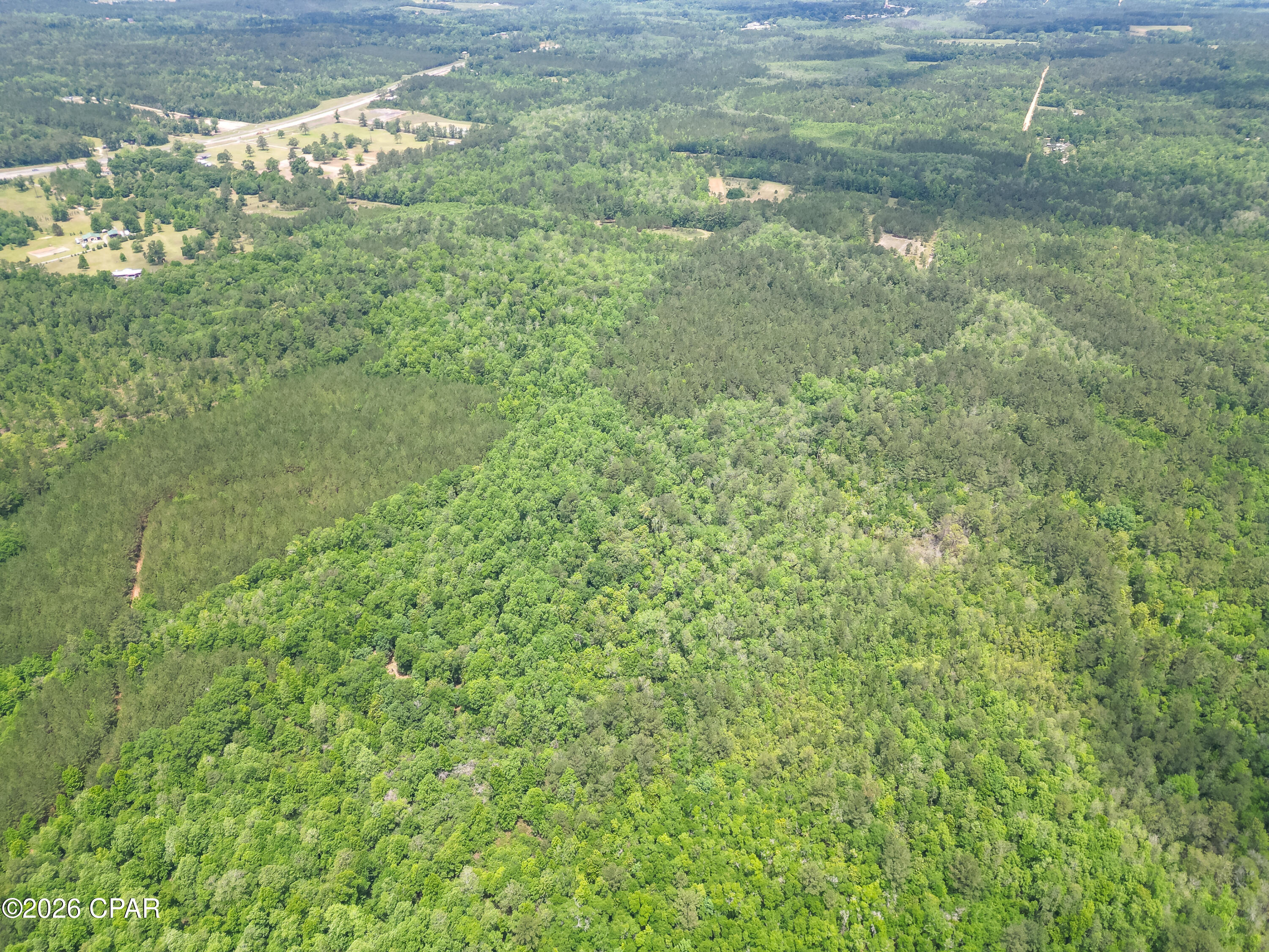This beautiful 130 +/ acre property in Chipley, FL, offers the kind of space and privacy that's getting harder and harder to find!   Located on Avon Street just off Highway 77, this heavily wooded parcel is well-suited for hunting, recreation, a private homesite, or simply owning a large piece of land as an investment to enjoy for years to come. With plenty of room to spread out and explore, the property has the feel of old Florida timberland with the convenience of nearby highway access.
Covered in mature woods and natural vegetation, this expansive tract is an excellent habitat for deer, turkey, and other wildlife native to the Florida Panhandle. Whether you enjoy hunting, riding ATVs, camping, or just spending time outdoors, this property gives you the room to do it! The size of the property easily allows for multiple hunting setups, trail systems, food plots, or future cabin sites while still maintaining plenty of privacy. 
Even with its quiet rural setting, the property is still within a reasonable drive to nearby towns and the Gulf Coast. Chipley is approximately 12 miles away for everyday shopping and conveniences, while Panama City is roughly 40 miles south. Panama City Beach and the Gulf beaches are only 50 miles away, making it easy to enjoy both the woods and the coast without being too far from either.
Large acreage tracts like this continue to hold strong value across the Florida Panhandle, especially those with strong wildlife habitat, and room to enjoy the outdoors. Whether you're looking for a hunting property, recreational getaway, future homesite, or long-term land investment, this 130+/- acre North Florida tract offers plenty of possibilities and the freedom to make it your own. Call today for more information!

Key Features:
• Excellent hunting and recreational property
• Property is comprised of 4 parcels totaling 130 +/- Acres
• Strong deer and turkey habitat
• Plenty of room for trails, food plots, and hunting setups
• Ideal for ATV riding, camping, and outdoor recreation
• Approximately 12 miles to Chipley
• Approximately 40 miles to Panama City
• Approximately 50 miles to Panama City Beach
• Private setting with long-term investment potential
 
Directions:  From the I-10 Chipley exit, take SR Highway 77 South 11.38 miles to Firetower Road. Turn left on Firetower Road and proceed 1.44 miles to Deltona Blvd.  Turn left on Deltona Blvd and proceed .23 miles to Timberlake Drive.  Proceed on Timberlake and veer to the right at .2 miles onto Canterbury Drive. Proceed .35 miles to the dead end.  Turn left on Avon Street to dead end.  Property easement is at the sign. 

Directions:  From the intersection of SR Hwy 20 and Sr 77, take SR Highway 77 North 12.88 miles to Firetower Road. Turn right onto Firetower Road and proceed 1.44 miles to Deltona Blvd.  Turn left on Deltona Blvd and proceed .23 miles to Timberlake Drive.  Proceed on Timberlake and veer to the right at .2 miles onto Canterbury Drive. Proceed .35 miles to the dead end.  Turn left on Avon Street to dead end.  Property easement is at the sign.