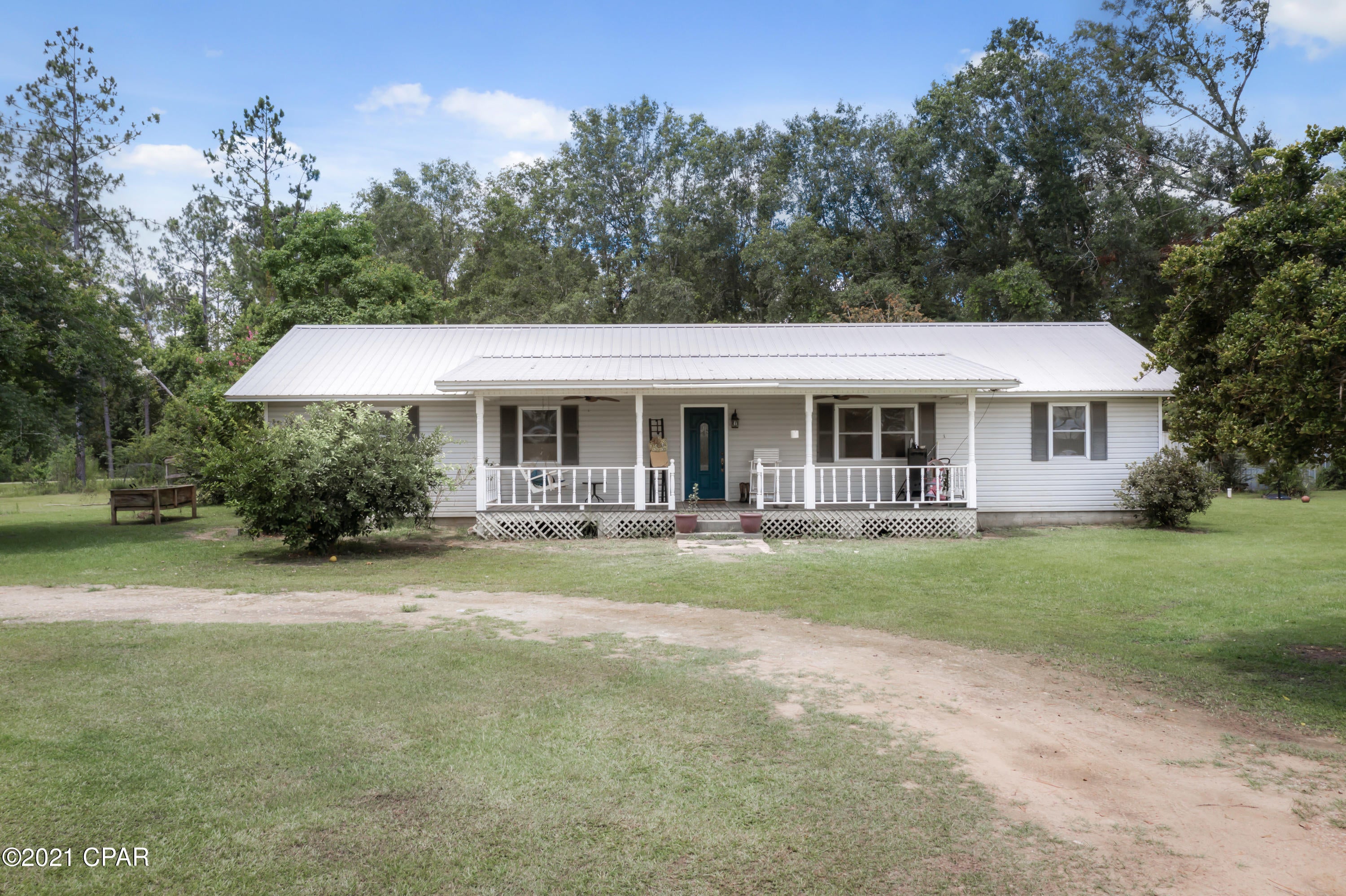Need more space? This 5-bedroom, 2 bath home is looking for its new owners. Inside you will find fresh paint throughout, newly installed vinyl plank flooring, eat-in kitchen with breakfast bar, spacious living room and master bedroom with wood ceiling, his/her closets and en-suite bath. Outside features include covered front porch, large back deck, storage shed and metal roof. Home is situated on over 2 acres directly off Orange Hill Road, a short drive to Hwy 77 and Interstate 10.