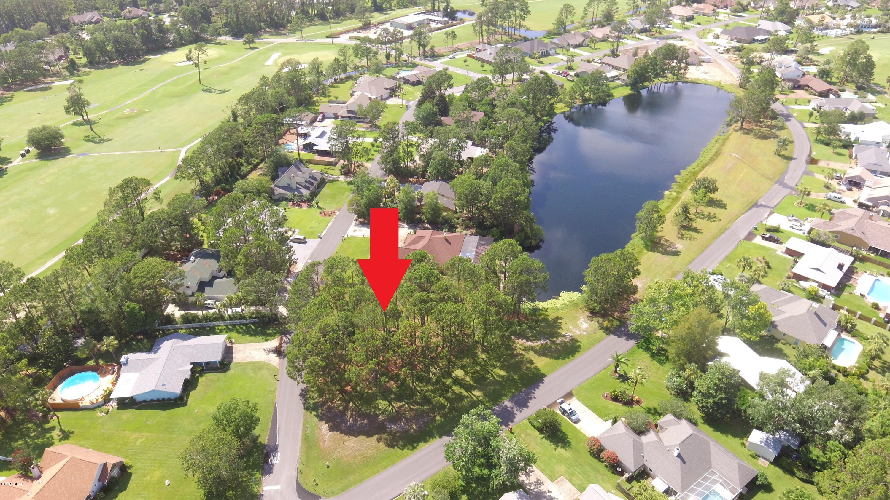 One of the largest residential lots on the beach. Well over half acre partially cleared with 90' lake frontage. This is a beautiful lot in highly desired neighborhood. Centrally located to schools, grocery stores, shopping and the beach. Come drive and walk this location then get your plans ready to build your dream home. You won't believe how nice this lot is.