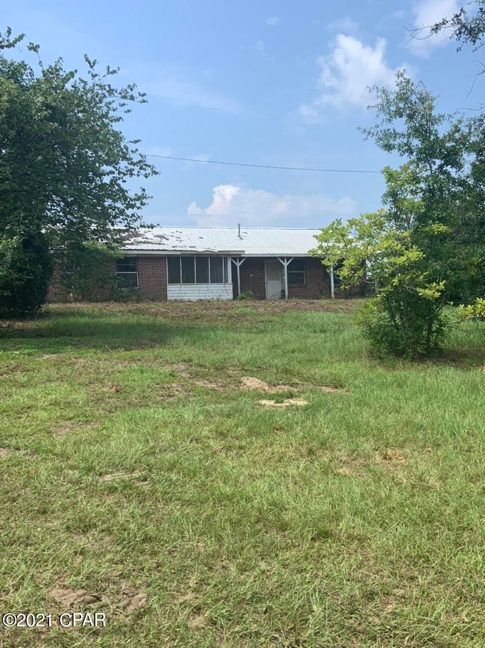 If you want to be close to the water here you go! Property is situated across the road from Lake Seminole and within walking distance to a public boat landing. It is within 3 minutes of Three Rivers State Park. Home and mobile home on property have extensive damage from hurricane. A nice workshop remains on the property. Property extends from Lake Seminole Rd all the way to Howell Rd. The opportunities are endless.