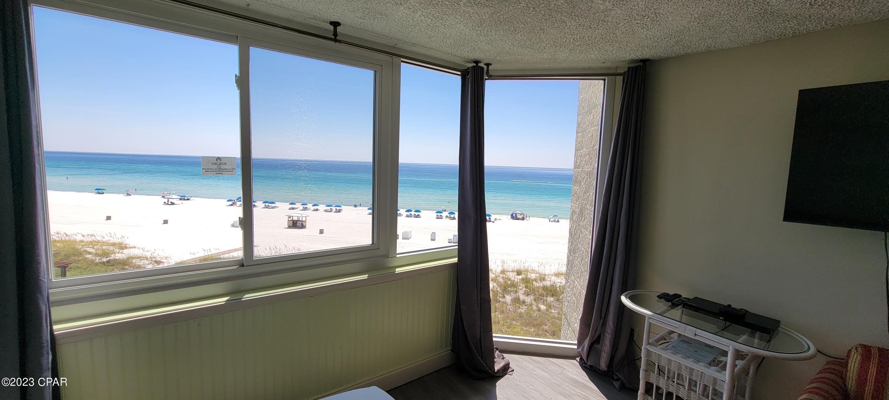 OWNER LIQUIDATING TWO UNITS AT BEAUTIFUL TOP OF THE GULF CONDOS! Buy them both! The other one is A319. Both PRICED TO SELL, DIRECTLY VIEWING THE BEAUTIFUL WHITE SANDS OF PANAMA CITY BEACH FLORIDA, overlooking the pools, and poolside snack bars! These units are great fun for your family to enjoy and rental income too! Fully furnished units ready for a quick sale! Amenities include a beautiful pool, kiddie pool, game room, picnic areas, grills, game areas and sunbathing areas, plus a shaded area to enjoy after a day in the sun! Call TODAY AND LET'S GET STARTED ON YOUR BEACH DREAMS!