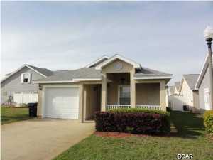 Fabulous ranch located in the Palm Cove subdivision! Kitchen boasts white cabinets, white appliances, and a breakfast bar! Living room with dining area! Master bedroom features a walk-in closet and a private bathroom with double vanity! Two additional bedrooms share a full bathroom! A must see! Please show and submit your offer today!
