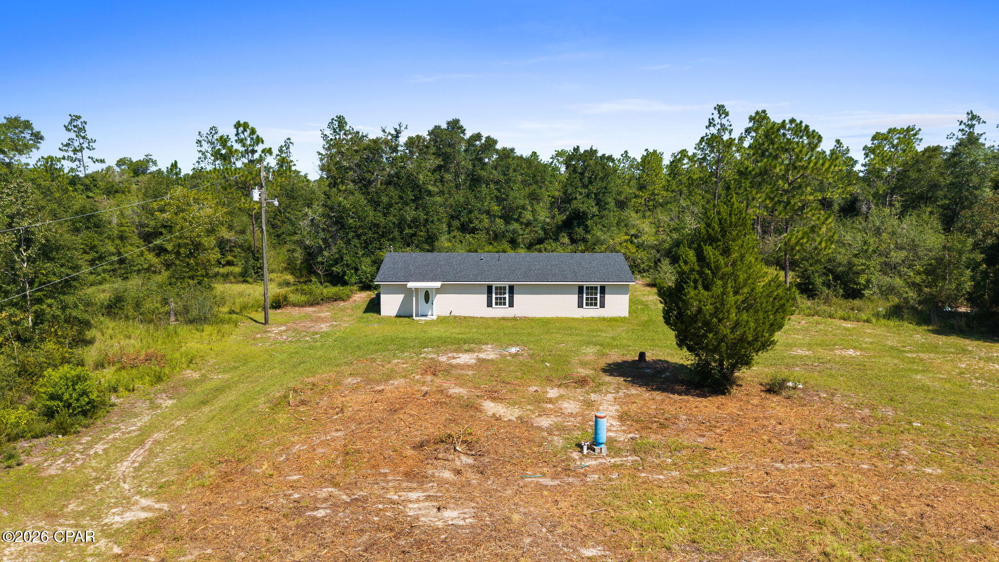Welcome to your private retreat!  This beautifully newly renovated home sits on 5 acres, offering the perfect combination of modern comfort, space and privacy. The This home offers plenty of room for entertaining, relaxing and everyday living.  It has new LVP flooring, new roof, new appliances, custom tile shower and much more. Outside, this 5 acre property offers endless possibilities from enjoying the peaceful surroundings and creating your own private oasis.  This place is a great opportunity for those looking for room to breathe while still having a beautifully updated home.