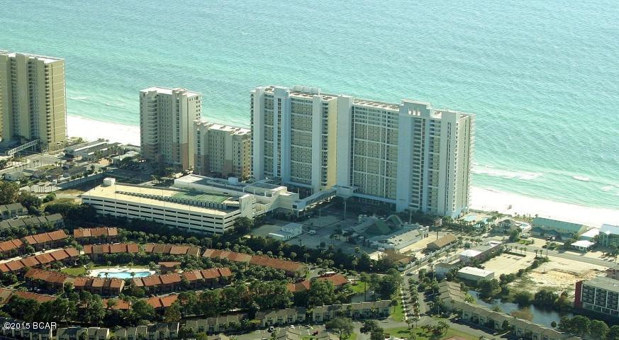 Tastefully decorated and located in the quiet East Tower (Tower II), this gulf-front 2 bedroom, 2 bath condo is a must see! Boasting a large gulf-front living and dining area as well as a ''gulf-front master bedroom'', this floor plan compliments those breathtaking views the Emerald Gulf Coast is known for. Floor-to-ceiling sliding doors across the living area and master bedroom allow for spectacular views of the gorgeous beaches and gulf water, makes this unit your very own tropical oasis. Tile floors throughout entire living area - newly carpeted bedrooms. Spacious kitchen features upgraded granite counter tops and stainless appliances plus a ''separate'' laundry room. The master bathroom has a large whirlpool tub with separate shower and dual vanity sinks. Master bedroom walk-in closet. New bedroom carpeting in October 2015. Refrigerator, water heater, TV's and A/C all replaced within last 2-3 years. Upgraded ceiling fans. Wet bar in living area. Majestic Beach Tower amenities are second to none, boasting two indoor heated pools, three large outdoor pools, 3 hot tubs, 'H2O' bar and grill, tennis court, convention facilities, stadium seating movie theater, fitness center ... the best facility in town complete with sauna and steam rooms, 'The Market' deli serving Starbucks and so much more. Jet ski rentals and parasailing are also at your disposal. Seller has a dedicated parking space (#408) on the walkover level next to elevator which is negotiable but not included in the price of the unit. Unit is rental ready for immediate income stream for new owner. Door entry lock does not convey with unit.  Buyer to verify square footage and HOA dues.