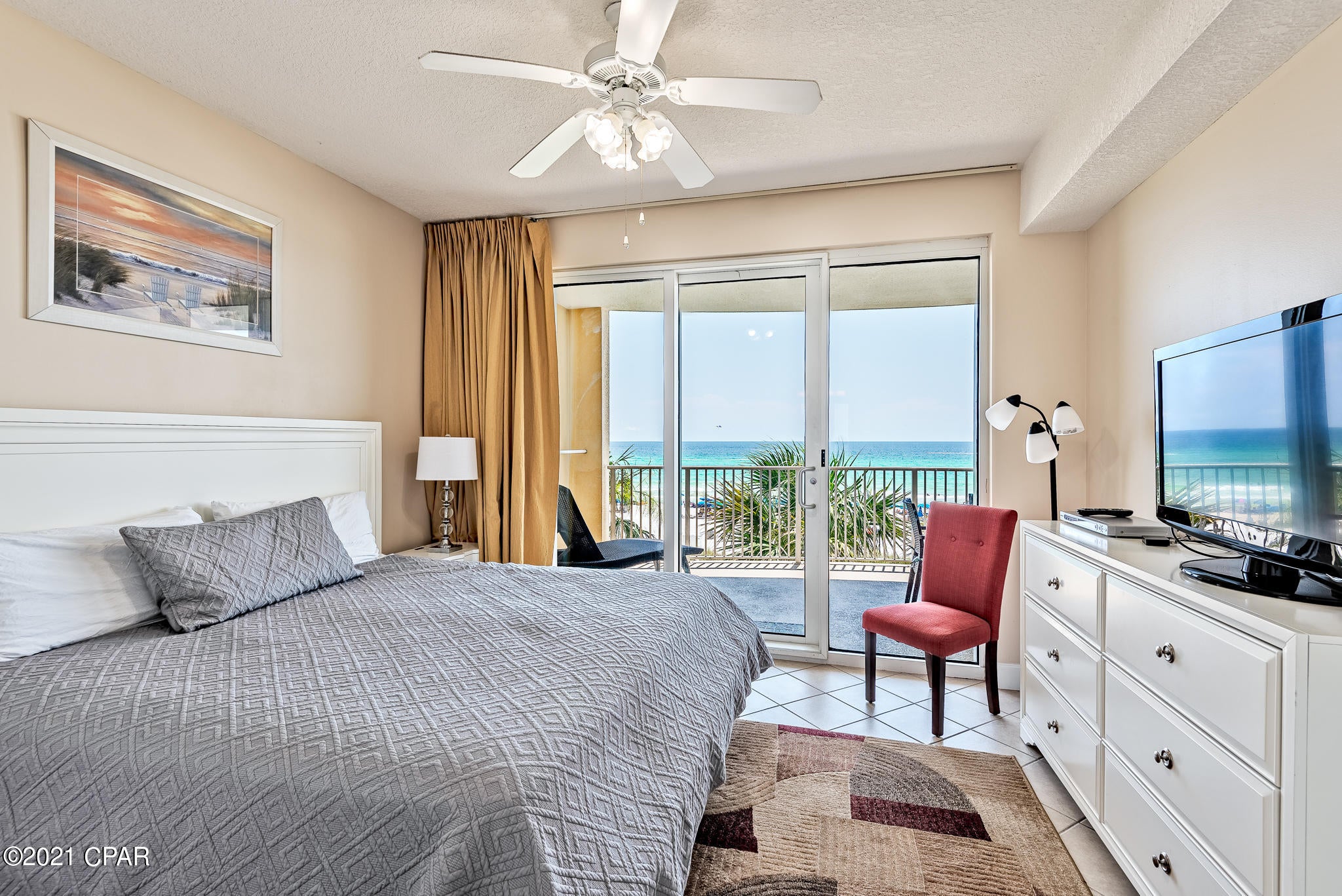 Third floor condo at Ocean Villa.  The building is known for being clean, well run, having a great floor plan, good parking, and a gigantic balcony for a 2-bedroom. The master bedroom opens directly onto the balcony overlooking the scenic Gulf of Mexico. This condo is tastefully decorated with tile throughout.  This unit has an outside owner's storage room. The complex has multiple levels of covered garage parking on both sides of Front Beach Road and a walkover for easy access. The third floor has a sauna, a small fitness area, and onsite Condo Association management. The ground floor has both outdoor (heated) and indoor pools, a sauna, as well as a hot tub and direct access to one of the beach. Measurements are approximate, verify if important.