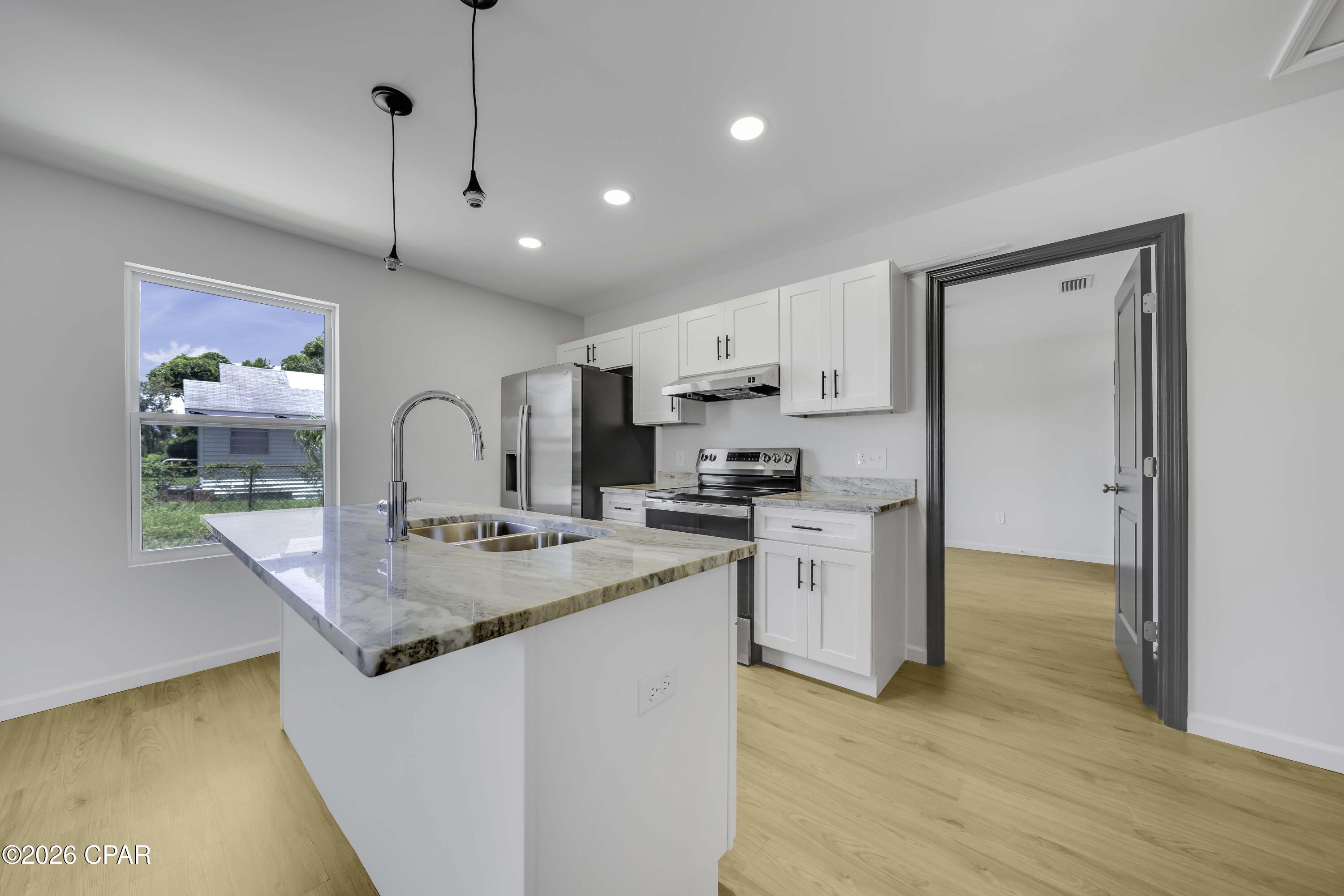 Be the first to call this beautiful, brand-new home yours! This stunning 3-bedroom, 2-bath duplex has never been lived in, giving you the rare opportunity to enjoy a fresh, modern home where everything is brand new and ready for its first resident.

Conveniently located just 7.5 miles from Tyndall Air Force Base and near Eastern Shipbuilding, this home is an excellent option for military personnel, shipbuilding professionals, and anyone looking for easy access to Panama City and the surrounding area. When it's time to unwind, you're only about 13 miles from the beautiful waters of Panama City Beach and 23 miles from the white-sand beaches of Mexico Beach.

Inside, you'll find a bright, open floor plan designed for comfortable everyday living, with modern finishes, clean lines, and all the benefits of new construction. The thoughtfully designed layout offers the perfect balance of style, comfort, and functionality--whether you're relaxing at home or entertaining guests.

Enjoy the convenience of a brand-new home, a great location, and easy access to work, shopping, dining, and some of the Gulf Coast's best beaches and attractions.

Don't miss your opportunity to be the very first resident of this exceptional new home--schedule your showing today!