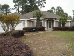 **MAJOR PRICE REDUCTION**-COME SEE THIS LARGE 3-4 BEDROOM HOME THAT INCLUDES 3 FULL BATHROOMS-THIS 2400 sq. ft. BEACH HOME IS MOVE IN READY LOCATED JUST OFF NORTH LAGOON-TOP RATED PATRONIS SCHOOL ZONE-CLOSE TO BEACH INCLUDES MANY CUSTOM FEATURES, UPGRADES AND MUCH, MUCH MORE!! INTERIOR: Custom built one owner home-Crown molding through entire main living area-home is wired for surround sound-Upgraded designer lighting fixtures and fans throughout-Custom built-in cabinetry and bookshelves in Living Room that also includes a fireplace-Another room is just off main Living area which includes french doors for privacy- This room can extend the living space for entertaining or can be used as a Florida Room, Playroom or your own personal Man-Cave or Craft Room! Large Master Bedroom has