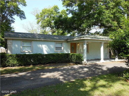 Unique opportunity in Wewahitchka featuring two adjoining parcels, two structures, and approximately 0.66 acres combined! The primary parcel, 02394-000R, consists of approximately 0.408 acres and features a 1,336-square-foot, 3-bedroom, 1.5-bath home along with a separate 1-bedroom, 1-bath ADU.. Also included is the adjoining 0.258-acre parcel, 02391-003R. This provides tremendous flexibility to the property. The ADU offers the potential to generate additional rental income, serve as guest accommodation, or provide a private living space for extended family. With two adjoining lots and two separate living spaces, this property presents an attractive opportunity for an owner-occupant looking to offset expenses with rental income or an investor seeking multiple income possibilities. Conveniently located close to the heart of Wewahitchka, the property provides easy access to town while offering over half an acre of combined land and plenty of room to spread out. Live in one and potentially rent the other! Property would also be perfect for multi-generational living.