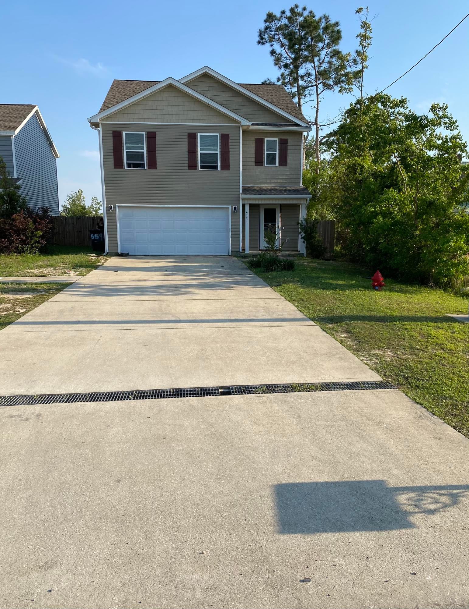 CURRENTLY UNDER CONTRACT! SELLER ACCEPTING BACKUP OFFERS!  Located Just Minutes to TAFB, Public Boat Ramp (leads out to Gulf of Mexico),  Shopping, Restaurants and much, much, more!  This Amazing 5BR 3BA Home w/ Open Concept Floor Plan and engineered hard wood floors downstairs, was made for Entertaining and Spending Time w/ Your Family.   Relax out back in your Hot Tub on the 33' x 15' Enclosed Porch overlooking a 24' x 5' Above Ground Pool Complete w/ an Attached Sun Deck in your Privacy Fenced Back Yard.