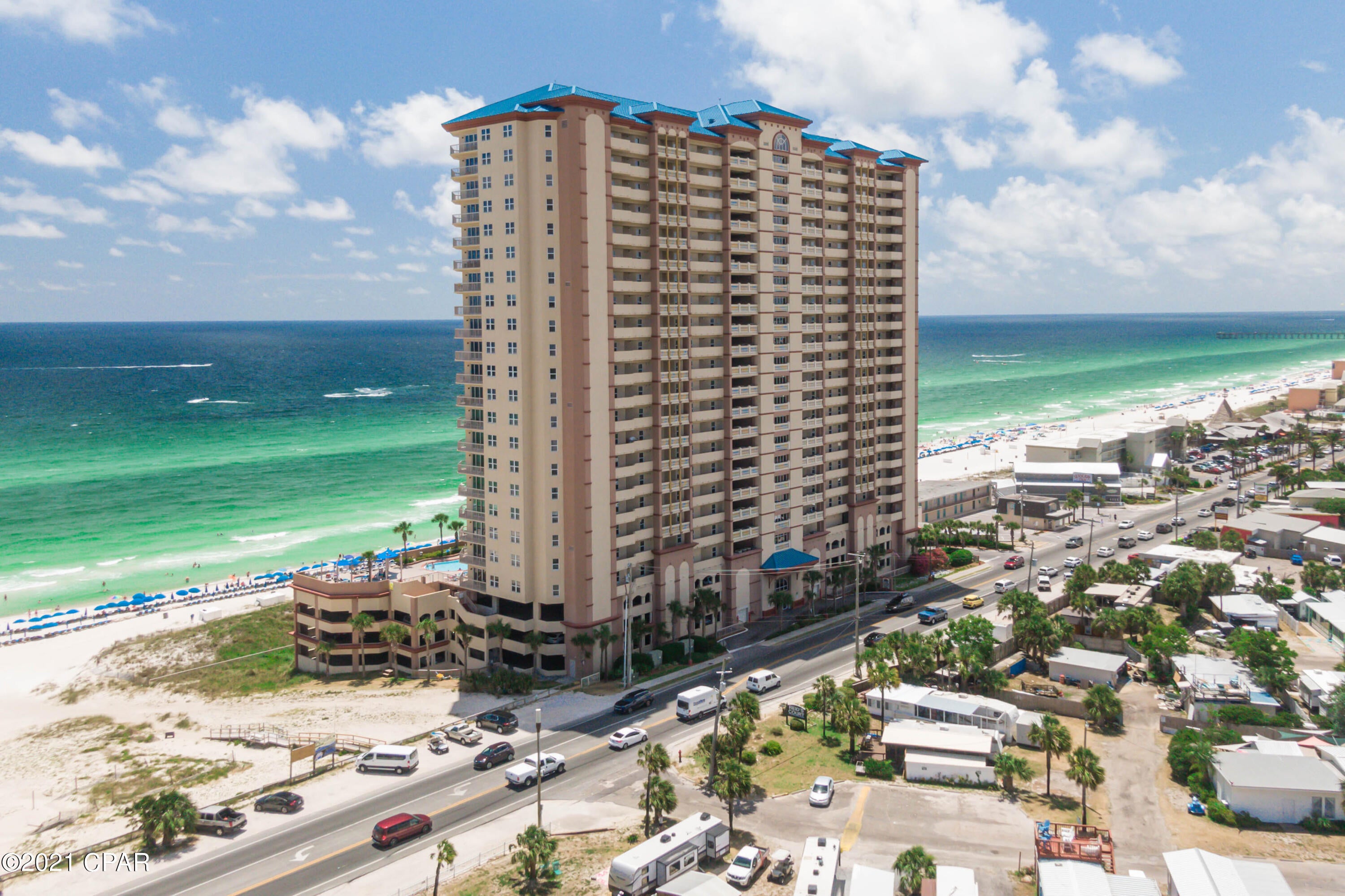 UNDER CONTRACT - TAKING BACKUPS - One of the best locations on Front Beach! With over $52,000 in bookings for 2021, this condo is being sold fully furnished and turn-key. Only a short trip away from all the fun and attractions, stunning gulf front balcony and views, and with 2 bedrooms with an extra bunk room you'll be able to sleep the entire family! With two large pools (one of which is heated), hot tubs, oversized fitness room, bar and grill area, and the entire beach in your backyard; this place has it all!