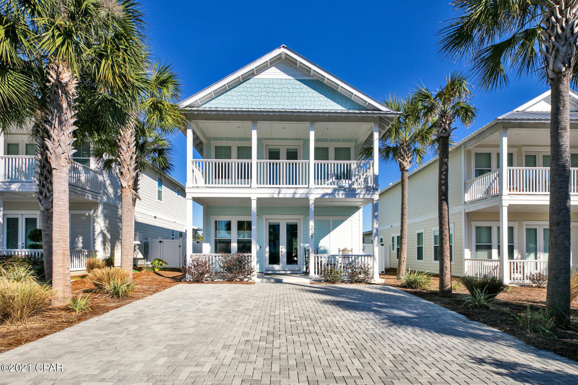 Step from the turquoise waters of the Gulf of Mexico into your spacious four-bedroom retreat with ocean-inspired interiors including 12 ft ceilings that fill with natural light. The home offers ample space for primary living featuring 2 MASTER BEDROOMS yet also could be a rental machine with its incredible projections of 145k!! This 2-story CUSTOM home, built in 2019, is the ideal beach house with 4 bedrooms and 3 and a half bathrooms and an additional den area that could be perfectly outfitted for a bunk room. Create a personalized, dreamy backyard oasis with a private pool and hot tub to your liking. SPLASH into beach life in this never-been-rented and newly constructed coastal retreat with a very low HOA community that is just a stone's throw to the beach and ''Pier 74' You can even view the emerald waters from your front driveway and have your feet in the sand within a quick 2-minute walk! The home also features a Tesla charging station and RV 30 amp hook-up!
Upgrades include tankless water heater, quartz kitchen countertops, glass mosaic backsplash, LVP flooring, 8-ft doors, custom blinds, tray master ceilings, damper controlled HVAC system, hardie-board plank siding, paver driveway, tesla charging station, RV hook-up, outdoor shower, and white vinyl privacy fence. This home sits on a big 40 x 150 lot with plenty of parking and curb appeal highlighted with Hardie Board Siding, Cedar Shakers and open-air balconies. This is the perfect location, near Pier Park shopping, restaurants, the airport AND SO CLOSE TO THE GULF OF MEXICO YOU CAN SEE IT!