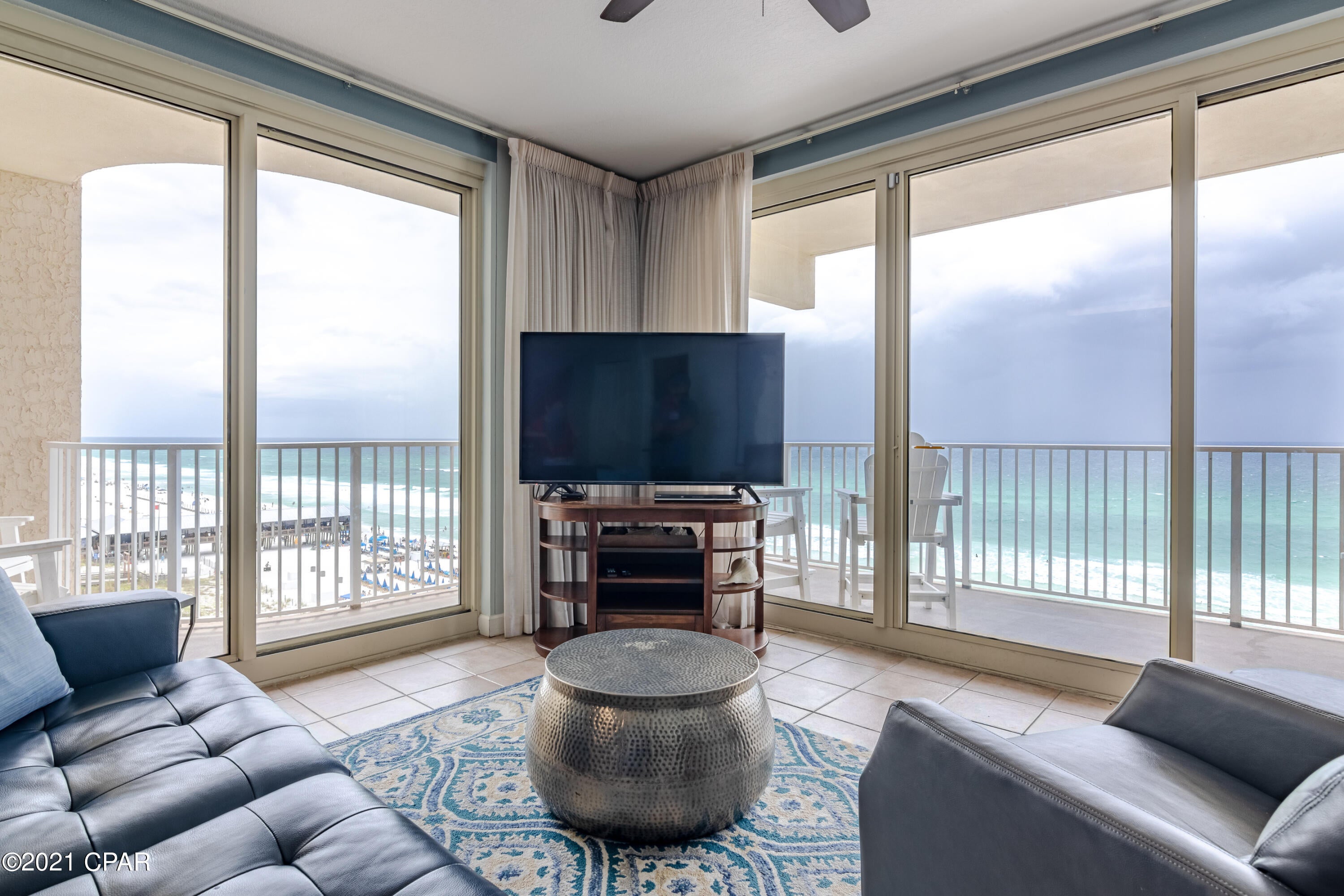 LOCATION, LOCATION, LOCATION!  7th floor unit All tiled floors throughout. This is the ''E'' floor plan which is a 2bd plus bunk floor plan (sleeps 8). It has a large wrap around balcony that overlooks both the gulf and the pool. Perfectly located on 7th floor, you can drive right up to the 7th floor to your parking space, avoid the elevators. .This 2bedroom and bunk room unit is sold furnished  and rental ready. The unit has tile throughout, wrap around balcony with amazing views and my favorite feature is the Gulf front master Bedroom. The Shores of Panama has amazing amenities that include a 14,000+ sq ft pool, an indoor pool, tiki bars, and its sits on the Gulf of Mexico white Sand.This unit comes with an assigned parking spot.