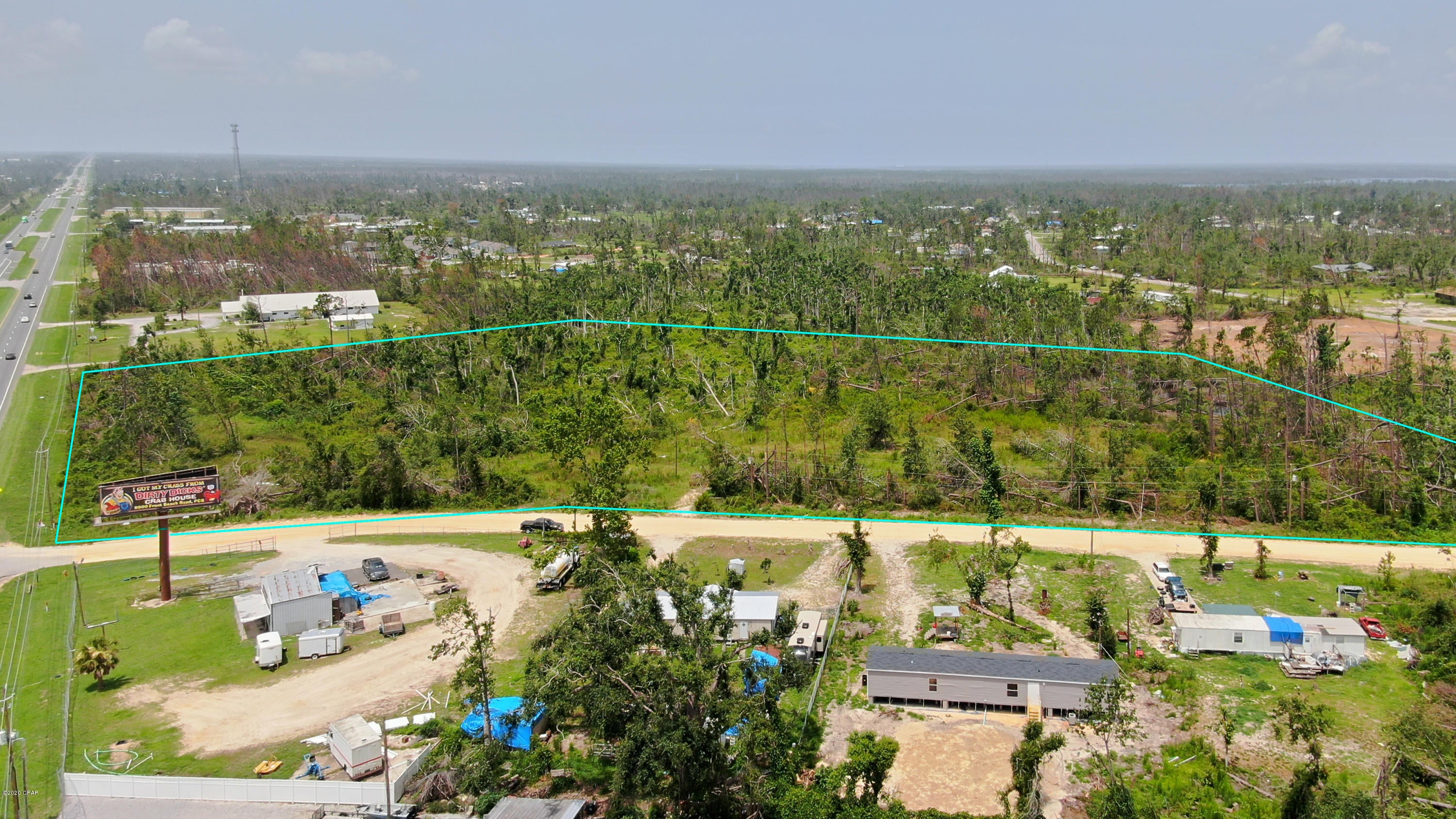 This two parcel property totals 8.7 acres. Great commercial potential featuring 422 ft of frontage on US Hwy 231. There is a median cut directly in front of the property on Hwy 231 making it easy to access. Located only 4.8 miles to Hwy 390, and 8.8 miles to 23rd Street. The South Parcel (4.22 acres) is zoned C-3 for General Commercial. The North Parcel (4.48 acres) is currently zoned R-2. Some portions of the parcel may be subject to a wetlands designation.

Other Parcel ID: 05588-000-000