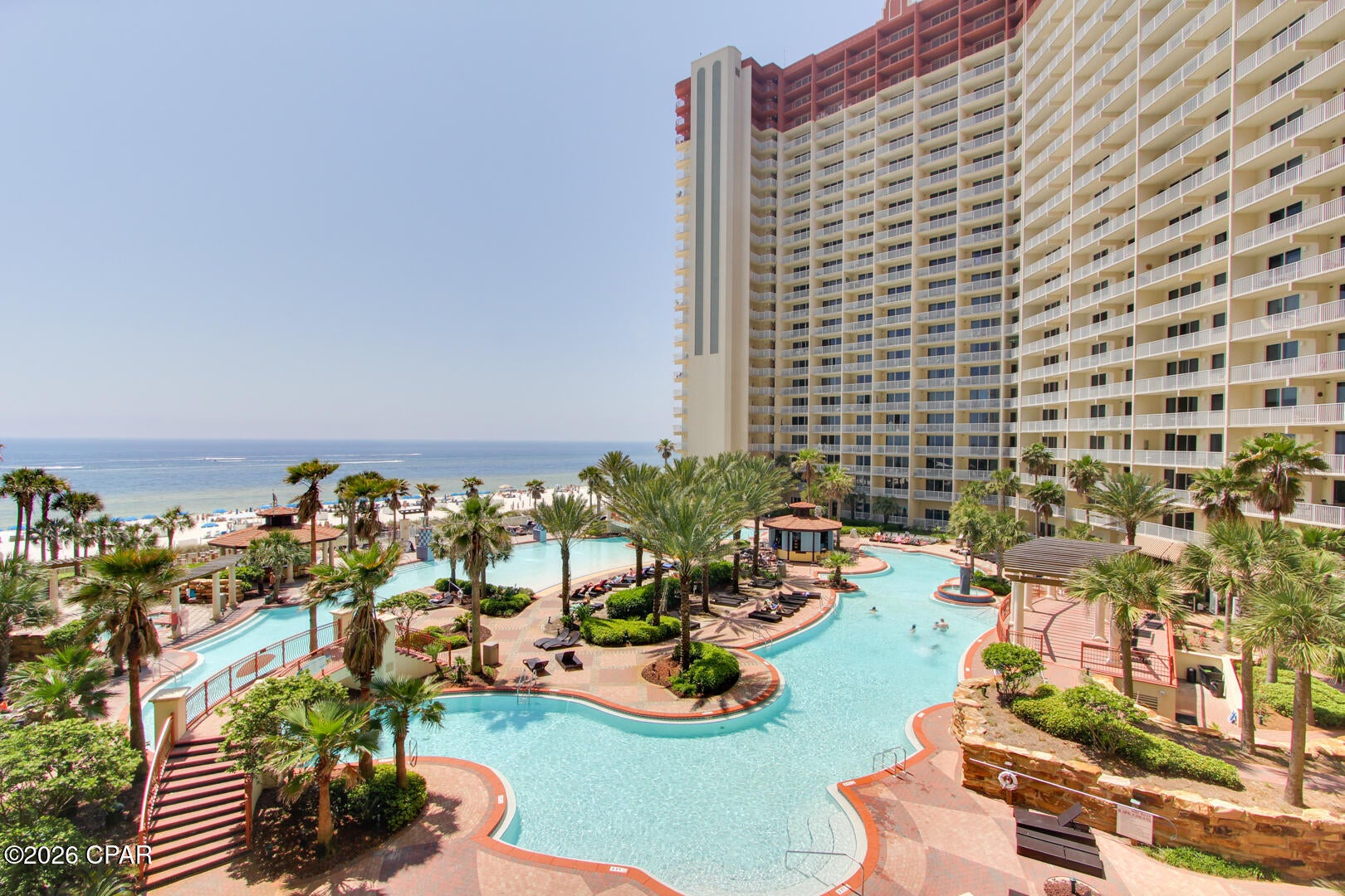 The ONLY ''H'' Floor Plan on the market !! Experience the ultimate blend of beachfront luxury and high-performing investment potential in this 2BD 3BA +bunk Gulf front condo at Shores of Panama. Located within the highly sought-after and seldom available H-floor-plan stack (only 23 in the entire building), this spacious condo offers an exceptional layout designed for both strong rental returns and unforgettable coastal living. The condo conveys fully furnished and rental-ready, making it an effortless investment opportunity or turnkey beach retreat.

This condo features two primary suites with ensuite baths, plus an additional bedroom and a separate bunk room, comfortably accommodating up to 10 guests. With three full bathrooms, the thoughtful configuration maximizes occupancy and guest comfort, making it one of the most versatile and desirable floor-plans in the resort.

The open-concept living and dining area (seating for eight) flows seamlessly to an oversized private balcony showcasing sweeping Gulf views, vibrant sunsets, and the resort's iconic lagoon-style pool. 

This unit also includes one deeded parking space.
Shores of Panama is home to the largest Gulf-front lagoon pool in Panama City Beach, with its spectacular 14,000+ sq ft zero-entry lagoon pool with palm-lined islands, fountains, and expansive hot tub. tropical palm islands, fountains, and an oversized hot tub--all just steps from exclusive beachfront access. Owners and guests also enjoy:  Indoor heated pool and hot tub, 24-hour fitness center, Seasonal poolside Tiki bar, Covered parking, and On-site security.

The location is unbeatable--walk next door to Pineapple Willy's for beachfront dining or cross the street to Laketown Wharf for multiple dining options including The Wharf Buffet, Juan Taco, and LuLu's Bar & Restaurant. Shopping, entertainment, and attractions are all within easy reach.

If you're looking for a well-positioned Gulf-front condo with proven rental appeal and unbeatable amenities--this is a standout opportunity. With exterior renovations scheduled to enhance curb appeal and long-term value, this is a strategic opportunity to secure this wonderful gulf front condo--ideal as a personal retreat, income powerhouse, or both. All information and HOA details are believed accurate but should be verified by buyers if important.
