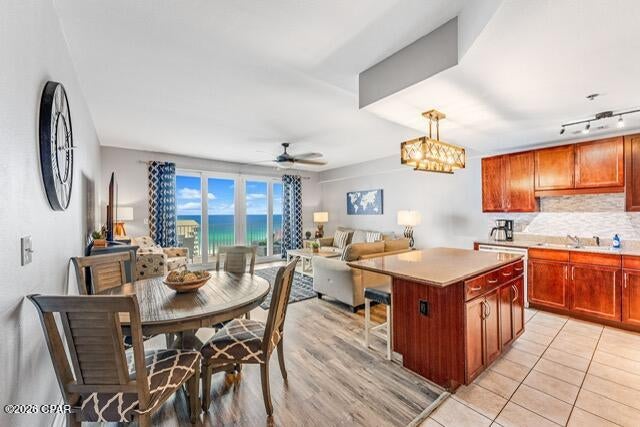 Welcome to Unit 1219 at Laketown Wharf Resort--a beautiful 1,047-square-foot condo offering the perfect combination of Gulf views, resort-style amenities, and strong rental potential. This desirable floor plan features 1 bedroom, 2 full bathrooms, and a separate bunk room, making it an ideal retreat for families, couples, or vacation renters.

Positioned perfectly within the building for convenient beach access, the condo showcases breathtaking Gulf views from the living and dining areas, while the bedroom side enjoys serene lake views. Thoughtfully updated and offered fully furnished and turn-key, this property is ready for immediate enjoyment or continued rental use.

Laketown Wharf offers an exceptional collection of resort amenities, including five pools, hot tubs, a fitness center, mini golf, a lakefront boardwalk, nightly fountain shows, and on-site dining. Best of all, you're just steps from the sugar-white sands of Panama City Beach and conveniently located near popular attractions, restaurants, and entertainment, including Pineapple Willy's and Pier Park.

Whether you're searching for a personal beach retreat, a high-performing investment, or the best of both, Unit 1219 delivers the views, upgrades, amenities, and rental potential you've been looking for. Don't miss your opportunity to own a turnkey Gulf-view condo in one of Panama City Beach's most popular resorts--schedule your private showing today!