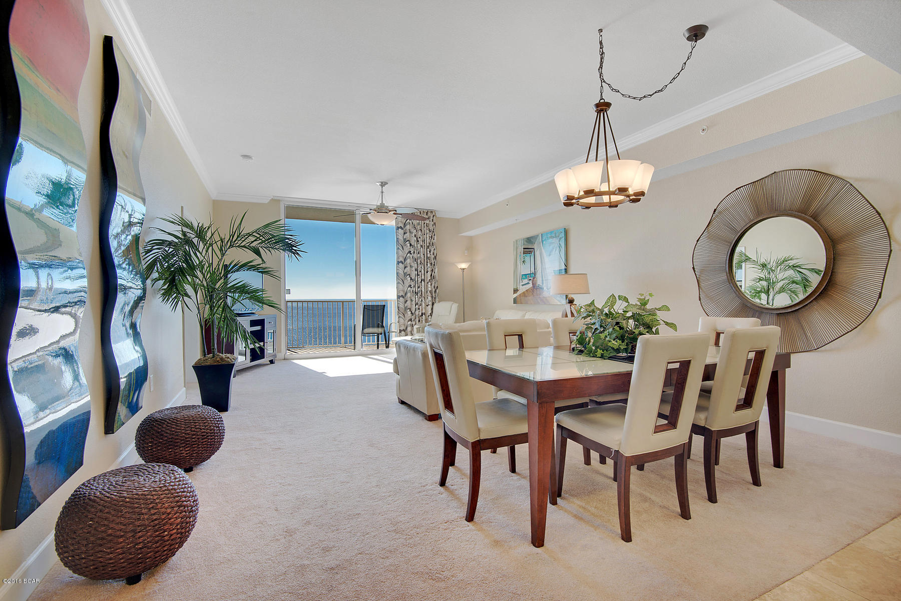 EASY SHOW  till March.  This unit has a very elegant contemporary feel.  It has been meticulously maintained. Carpet replaced 2 years ago,Coastal Energy High Efficiency Heating System has reduced electric bills! Crown molding, newly installed granite countertops, High impact glass windows and doors.  Beautiful views of the snow white sand and the blue green emerald waters.  You can't go wrong at Tidewater Beach Resort.  It offers 3 pools, 2 outside and one inside.  7 high speed elevators, fitness room with roman spa, on site convenience store,movie theater, bar & grill.