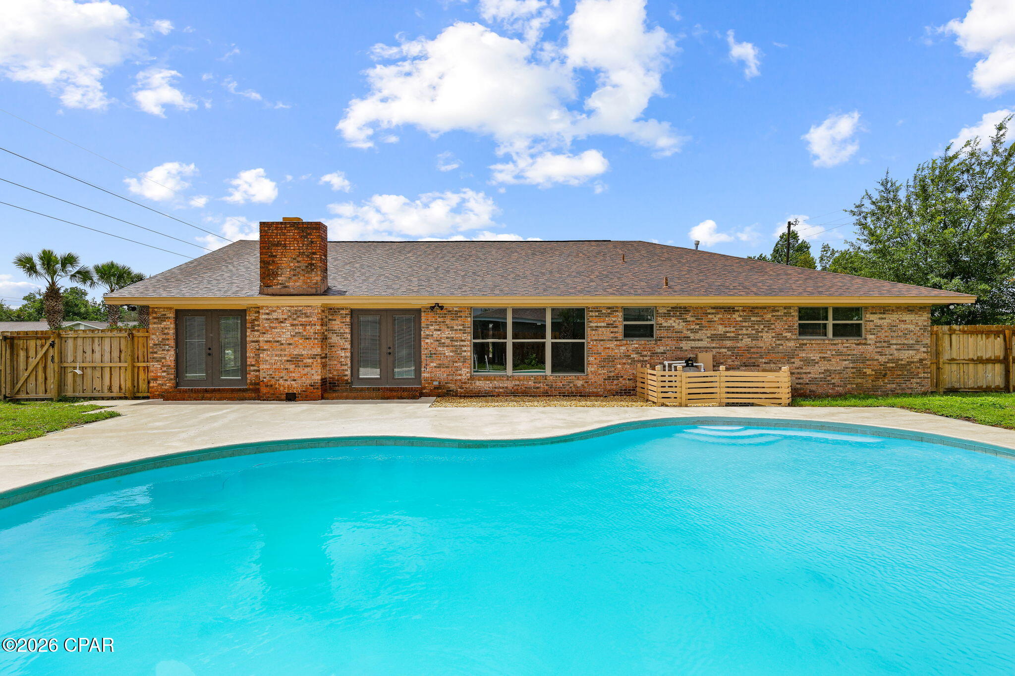 Welcome home to this spacious 6-bedroom, 3-bathroom property that offers the perfect blend of comfort, convenience, and outdoor living. Move-in ready and thoughtfully maintained, this home provides plenty of room for families, guests, a home office, or multi-generational living.

Step outside to your own private backyard retreat featuring a sparkling pool, a fully fenced yard, and plenty of space for entertaining, pets, or play. Whether you're hosting summer gatherings or enjoying a quiet evening outdoors, this backyard is designed to be enjoyed year-round.

Located in a highly desirable neighborhood, this home offers a central location with quick access to shopping, dining, schools, parks, and everything the area has to offer. The generous yard provides the space you've been looking for, while the home's functional layout makes everyday living easy.

If you're searching for a home that combines size, location, and lifestyle, this one checks all the boxes. Don't miss your opportunity to make this beautiful move-in-ready home yours!