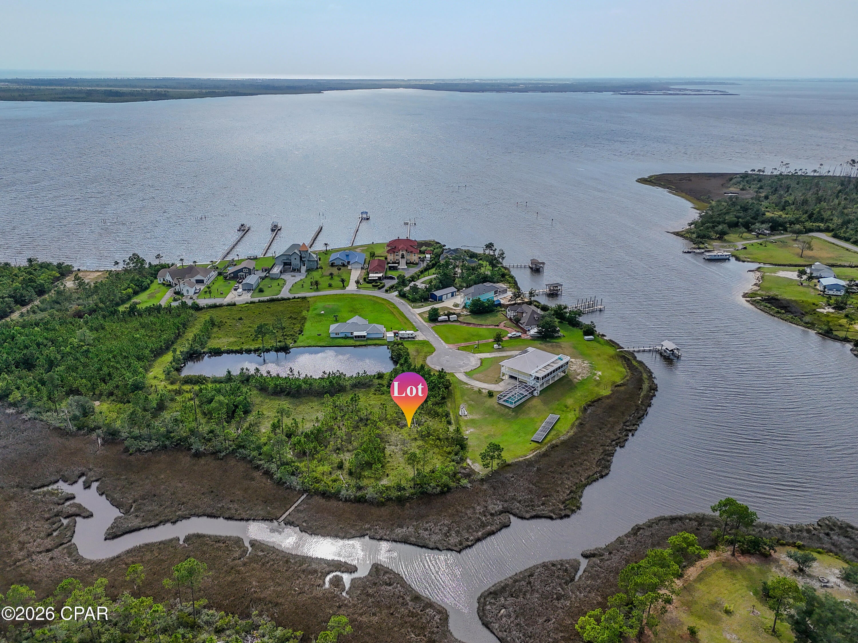 Waterfront Opportunity on East Bay
Discover the possibilities at 4801 E Bay Drive, a rare 0.69-acre vacant waterfront lot offering the perfect setting to build the property you've always envisioned. With navigable water access leading directly to East Bay, you'll have the freedom to get out on the water and explore wherever your heart desires.

Whether you're looking to enjoy the open waters of East Bay, venture toward the Intracoastal Waterway, or simply spend quiet mornings and peaceful evenings along the shoreline, this property puts you just a short boat ride from it all.

Located in a quiet, lightly developed area, this property offers a sense of privacy and tranquility that is increasingly hard to find. With ample space and waterfront access, it's an ideal opportunity to create a custom home, retreat, or personal waterfront escape tailored to your vision.

Build what you desire. Live where the water is your backyard. Enjoy the peace, privacy, and freedom that waterfront living provides.