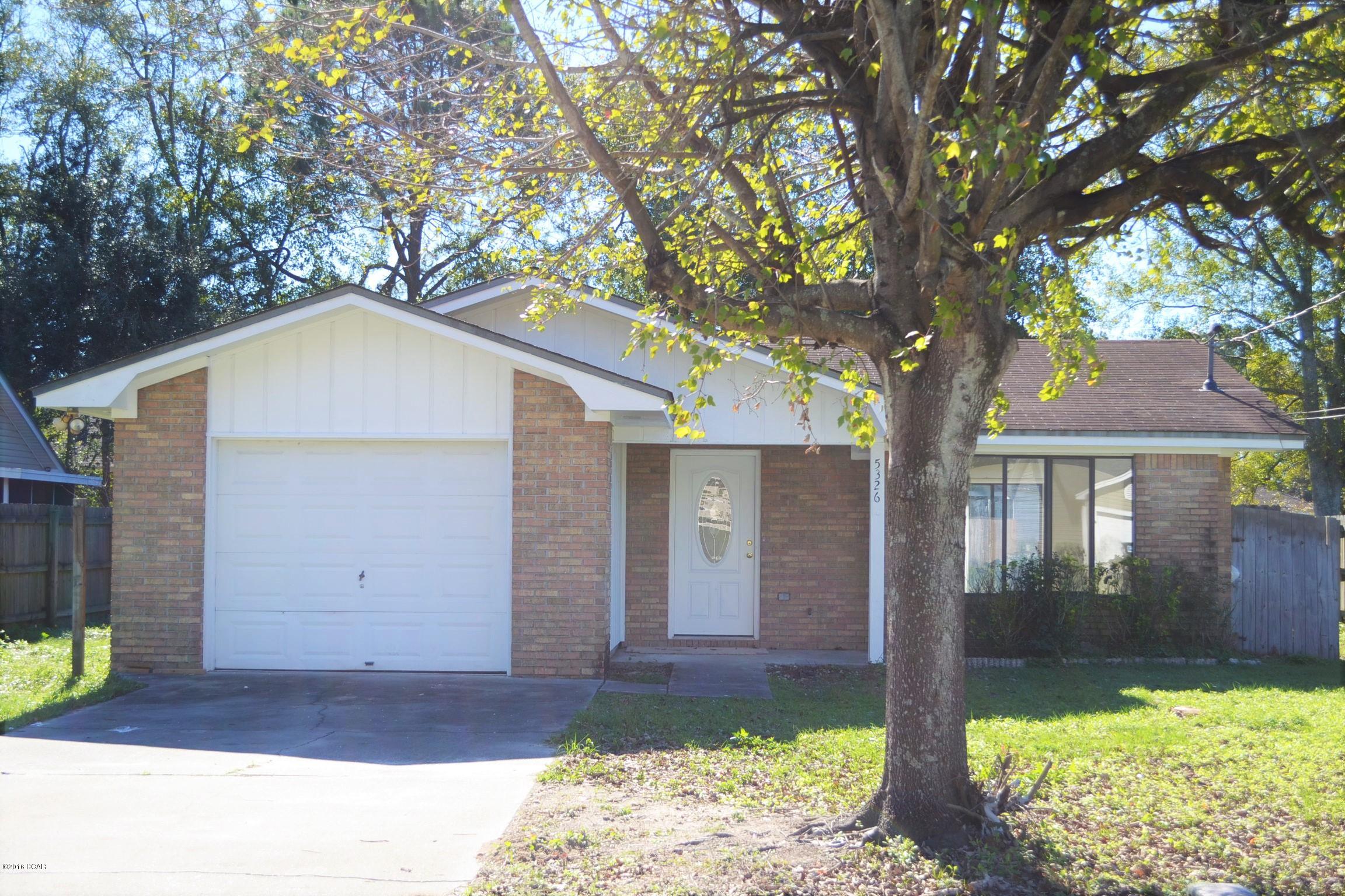 ATTRACTIVE HOME NEAR TYNDALL AFB! The interior of this home features 3 bedrooms, 2 baths, an XL living room with vaulted ceiling, an eat-in kitchen with new appliances, new tile flooring, new laminate wood flooring in the bedrooms (no carpet), crown molding in every room, interior laundry, ample natural light and a 1 car garage. The 15x11 master bedroom has a 5x6 walk-in closet and an adjoining bath. The exterior features a privacy fenced backyard, a good size yard, a large open patio and a metal storage shed for additional storage. The home is located at the end of a cul-de-sac and is centrally located to schools, shopping, grocery, entertainment, etc. Call today for your own private preview. All information derived from homeowner and public record; measurements approximate.
