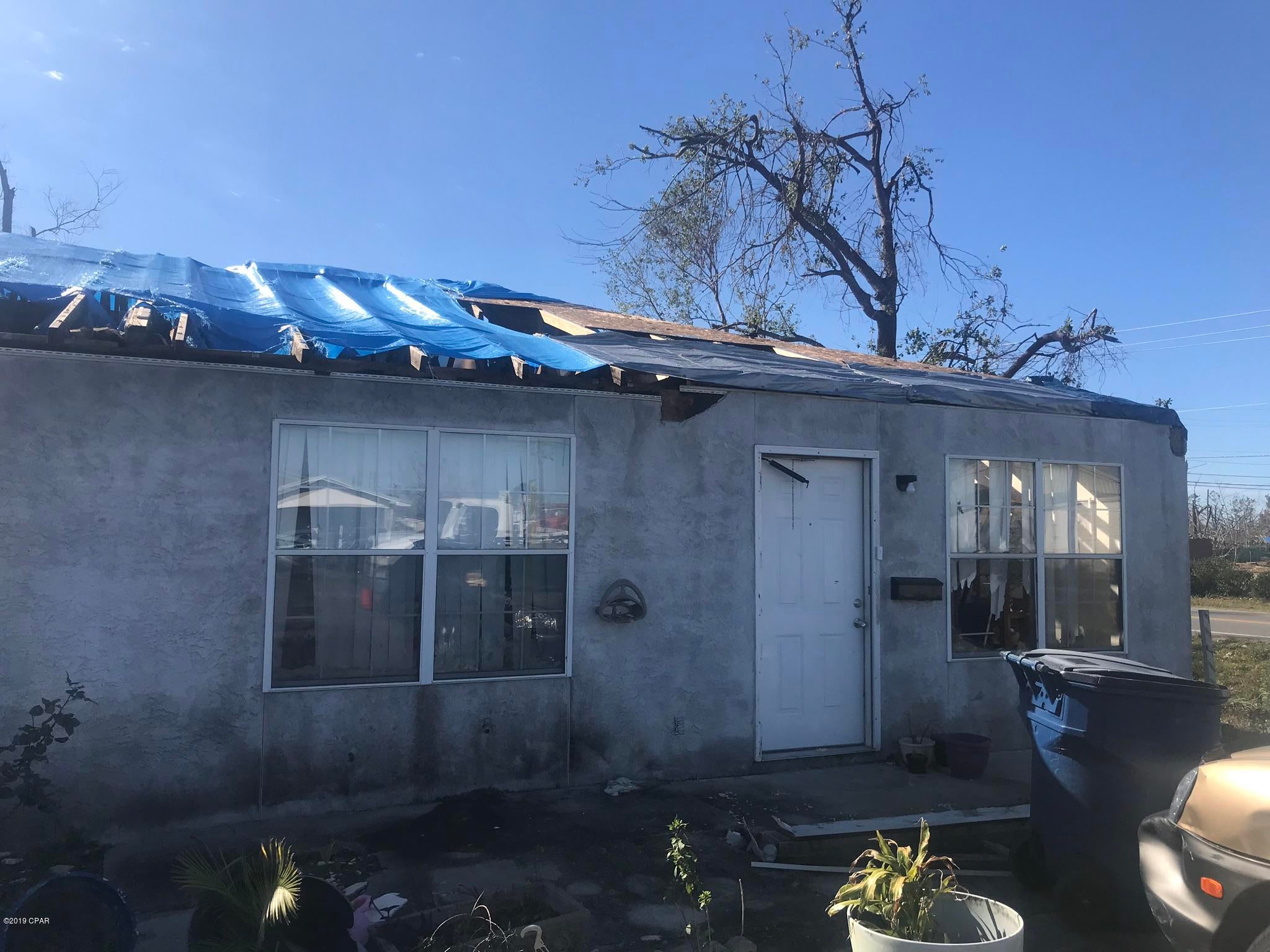 Opportunity Knocks! Hurricane Michael Damaged this 2 bedroom 1 bath stucco home located close to Bay Medical, Tyndall Air Force Base, water, and shopping. Investor opportunity to rebuild this home that is being Sold AS-IS, Where-Is, and is priced accordingly. Seller to make no repairs, demolition, disposal of debris, or clean up. All measurements are approximate, please verify if important.
