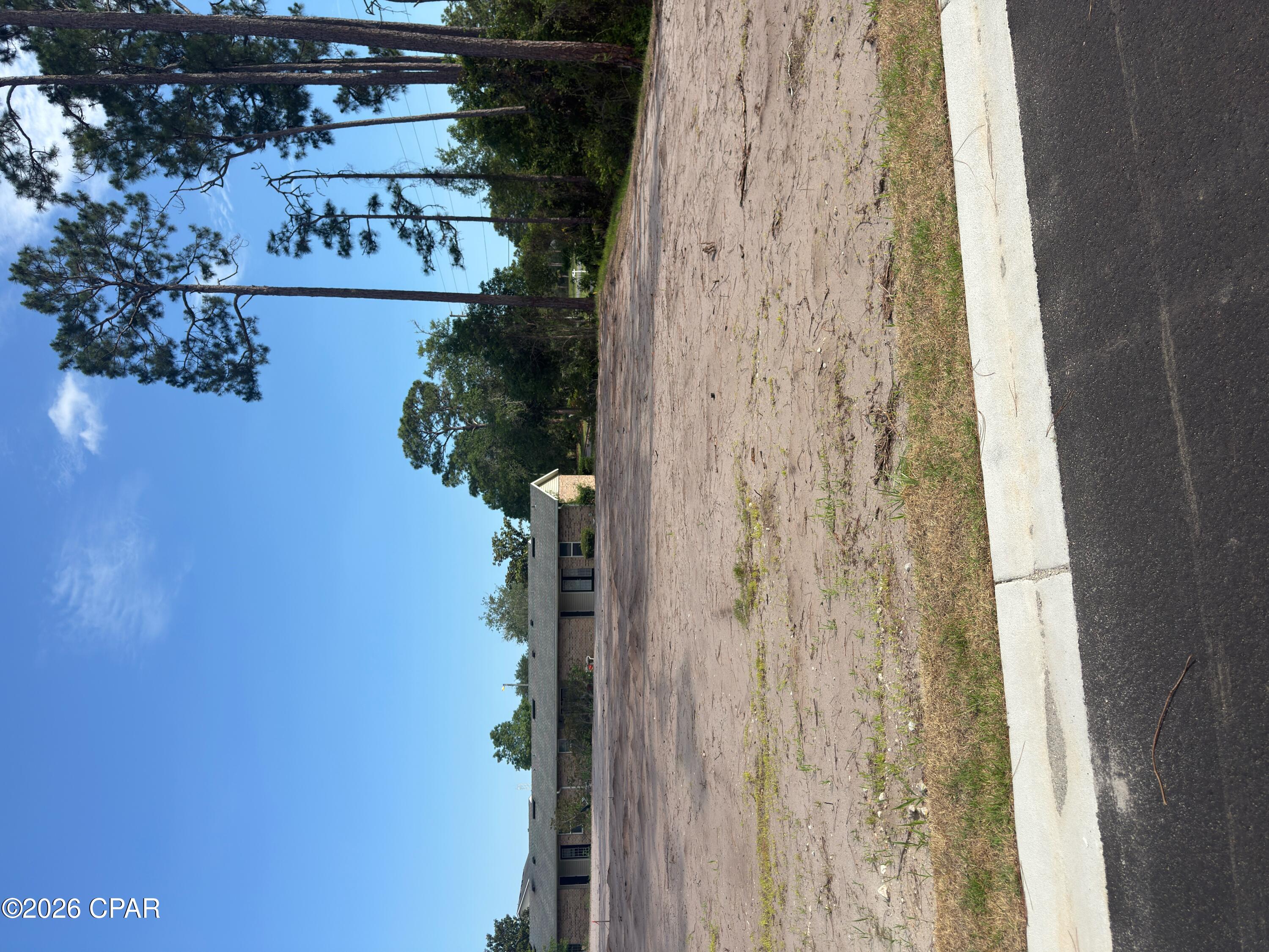 Port St Joe's newest gated and landscaped community with all the possibilities one could ask for. These lots are all X FLOOD ZONE and are eligible for SHORT TERM (DAY, WEEK, OR MONTHLY) or LONG TERM RENTALS. One can legally GOLF CART to Downtown or have easy access to St Joseph Bay. All lots are cleared and ready to build on with no timeframe to for building. Amenities already in place area; Paved street with ribbon curbing, entrance with signage and landscaping, sodded entry on Garrison Ave, water, sewer, under ground electric, elegant street lights for security. Amenities to be installed by the developer are privacy fencing, gated entry and bamboo accents for a border. Subdivision is under the County building and zoning regulations, not The City of Port St Joe.