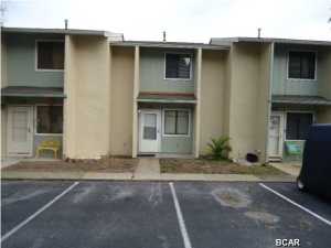 Age, SF, and dimensions approximate. Unfurnished unit with laminate floors upstairs and new laminate floors downstairs. Just painted inside. Very close to beach walk. Complex has 11 pools to include clubhouse with pool on the beach. Gated community and pet friendly.