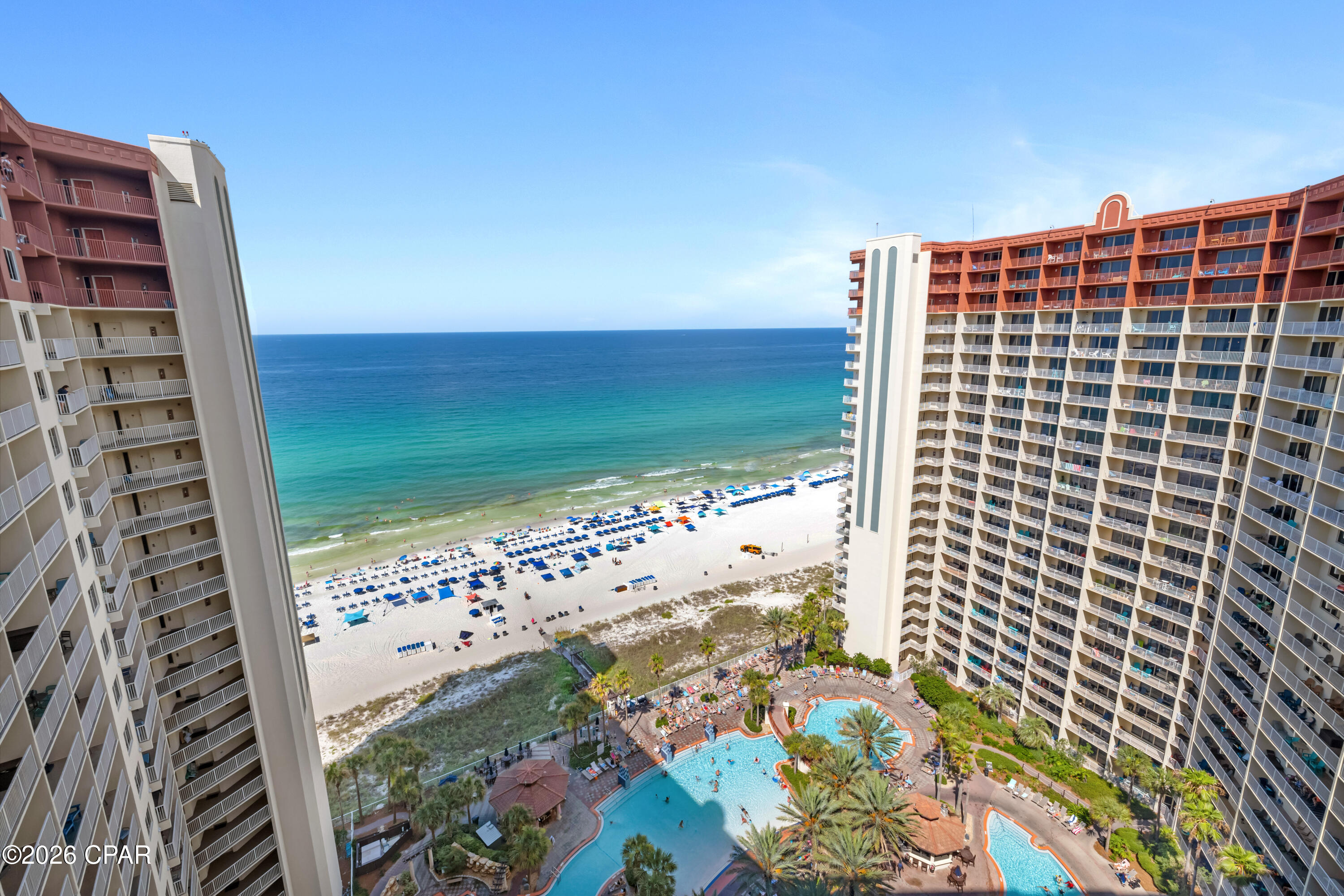 CURRENTLY UNDER CONTRACT, SELLER WILL CONSIDER BACKUP OFFERS

20TH FLOOR. GULF-SIDE PRIMARY. DEEDED PARKING.
Shores of Panama 2020 brings the 20/20 vision concept to life with Gulf and pool views from a higher-floor position in one of Panama City Beach's most recognized Gulf-front resorts. Located on the 20th floor in the 20 stack, this L floor plan offers 2 bedrooms, a bunk area, 2.5 bathrooms, three sleeping areas, and a large balcony accessible from both the living room and the Gulf-side primary bedroom.
The interior features tile flooring throughout the entire unit, a fully equipped kitchen with stainless steel appliances, granite countertops, and a tile backsplash. The hallway includes a stackable washer and dryer, and the condo is offered turnkey for continued use and enjoyment. The primary bedroom includes Gulf views, a king-size bed, and a sliding glass door opening directly to the large balcony. The primary bathroom has been updated with a double vanity and glass shower door, while the second bedroom includes a queen-size bed. A deeded parking space on the 10th floor adds an important convenience within the resort.
Shores of Panama Resort features one of the largest Gulf-front lagoon-style pools in Panama City Beach. The zero-entry tropical pool includes palm-lined islands, fountains, and a spacious hot tub along the resort's private beachfront access. Additional amenities include an indoor heated pool and hot tub, a 24-hour fitness center, and a seasonal poolside Tiki bar.
Located in the heart of Panama City Beach, Shores of Panama places dining, shopping, and entertainment nearby. Pineapple Willy's is adjacent to the resort, while Laketown Wharf directly across the street offers dining, retail, and entertainment options including Wharf Seafood Buffet, The Candymaker Ice Cream Shop, PCB Pizza, In Cahoots, The Press, The Bun Lab, 810 Billiards & Bowling, salon services, and more. Panama City Beach has also welcomed newer attractions and entertainment venues including Dolly Parton's Pirates Voyage Dinner & Show, Topgolf, McGuire's Irish Pub, and Tootsie's Orchid Lounge.

HOA dues are $3,705.85 per quarter. 

All information, rental income, HOA fees, assessments, measurements, and property details are deemed reliable but not guaranteed; buyer to verify if important.