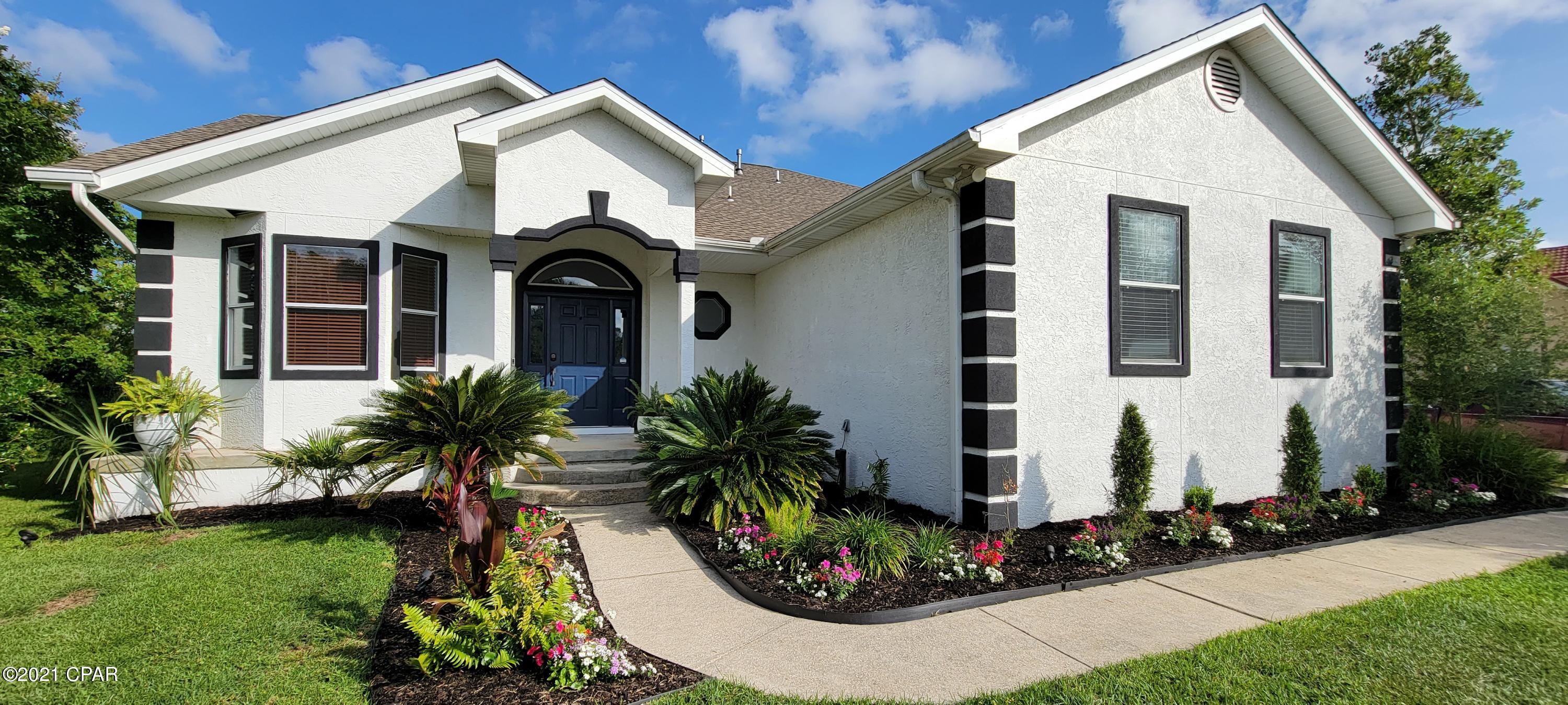 ALL OFFERS MUST BE SUBMITTED BY 5PM ON 05/31/21. Be sure to view the Matterport in the tour section. Don't miss out on the opportunity to own this beautiful home with a modern industrial beach interior. Enjoy the view of the bay (Goose Bay) from the media room,  sunroom, master bedroom and bath. The master bedroom and laundry are on the main floor. Master bath features a walk in shower with separate garden tub, pocket doors and concrete counter. This home features a media room with projector and screen ready for movie night (power sofa may convey with property with an acceptable offer), central vacuum, concrete counters, stainless steel appliances, fireplace, amazing laundry room with built in dog kennel, built in bunk beds with storage, a brand new Trex deck to enjoy the sunsets on the bay. Freshly painted interior to include the very user friendly concrete floors. Love to cook? Grow your favorite herbs in the green house window over the kitchen sink. Hurry and call today!