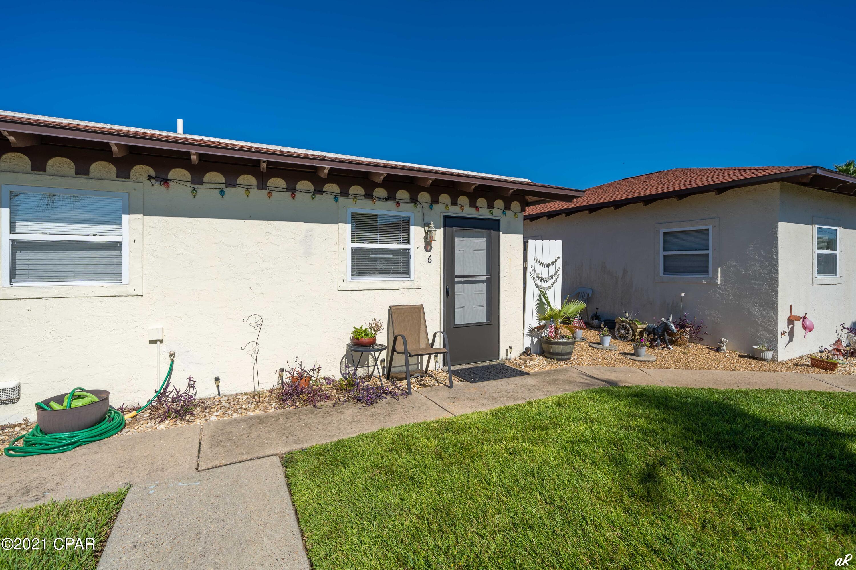 2 Bedroom, 1 bath townhome located within a short walk to the beach in a quaint New Mexico-style community, Embarcadero. This unit is immaculate with fresh paint, new windows, ceramic tile floors throughout and newly updated kitchen. It has an open concept with the kitchen, dining and living room areas. There is a washer/dryer hookup inside. Outside your front door is plenty of palms to hang your hammock or enjoy a meal outside with a side patio with table. The nicely manicured community features beautiful landscape, a pool, and grill area. HOA includes basic cable, water/sewer, and garbage. Tenant occupied on a month to month lease term at $1,100 per month.