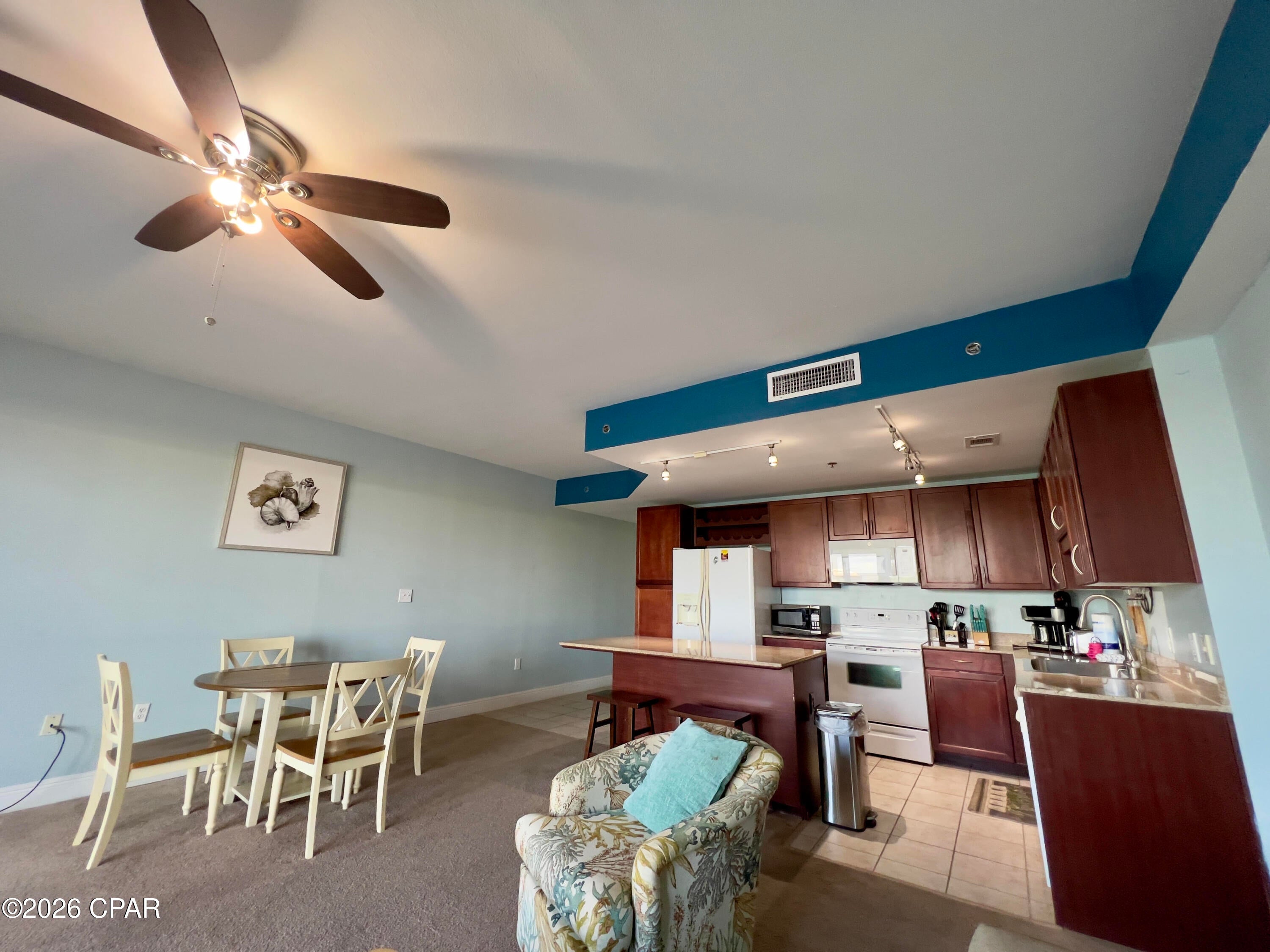 Step into a beautiful beach condo located in Laketown Wharf Resort of Panama City Beach, FL. This is a well maintained 1 bedroom plus a full bunkroom, 2-full baths condo featuring granite counters, updated lighting in kitchen, walk-in closet in master bedroom, stacked washer and dryer remains, 8'x19' covered balcony with great views of the lake and nightly Vegas style light show.
This condo is located directly across the street from the Gulf and has gated access and boardwalk straight to the sand. COA dues are paid quarterly and include Hazard Insurance, Cable, Wifi, Water, Garbage,Pest Control and access to 2-story gym, pickleball, postal room, and all 5 pools on the property. 24hr property patrol/security and many great restaurants and a huge boardwalk. Come enjoy Laketown Wharf Resort. This is a best-buy condo, furnished and rental ready!