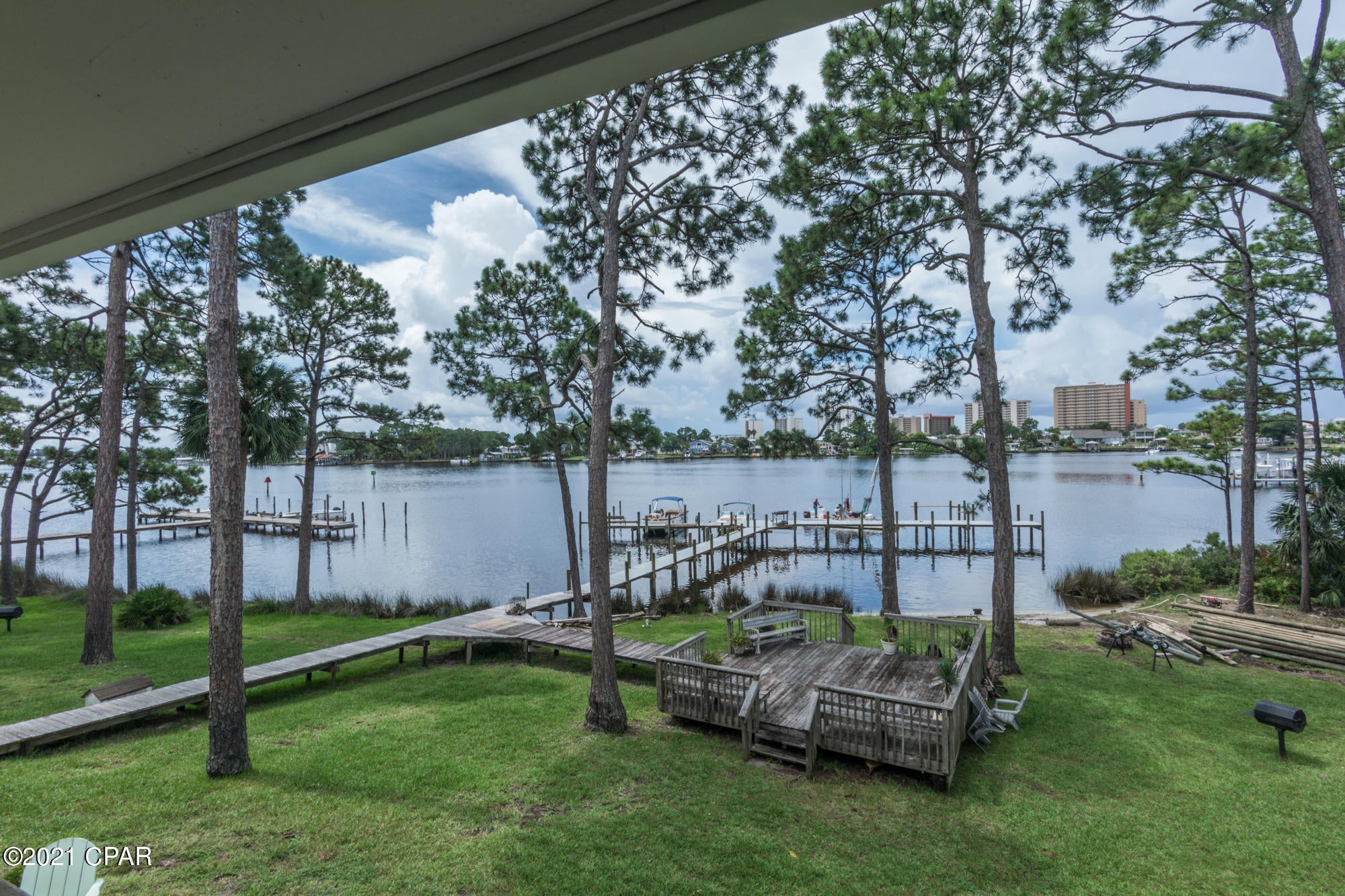 Beautiful Remodeled 

Lagoon Front 2 bed 2 bath Condo.

2nd Floor unit with Numbered Parking space out front of it. You will not find anything Water Front at this Price.Must SEE 

Master Bedroom with walk-in closet and Private Bath. 2nd Bedroom and Bath,

PLUS Huge Kitchen and Family Room area with Lagoon Views.

Sliding doors onto the Deck where you can relax, Enjoy the Views and Nature.

Even a Nice size storage room off of the Deck. (It has been floored with Wood Look Vinyl Plank Like the whole House !

Granite countertop island with under mount stainless sink. Fireplace with shiplap feature wall. Boat Slip does not Come with this Unit .You can get on a Waiting List Minutes to the gulf.