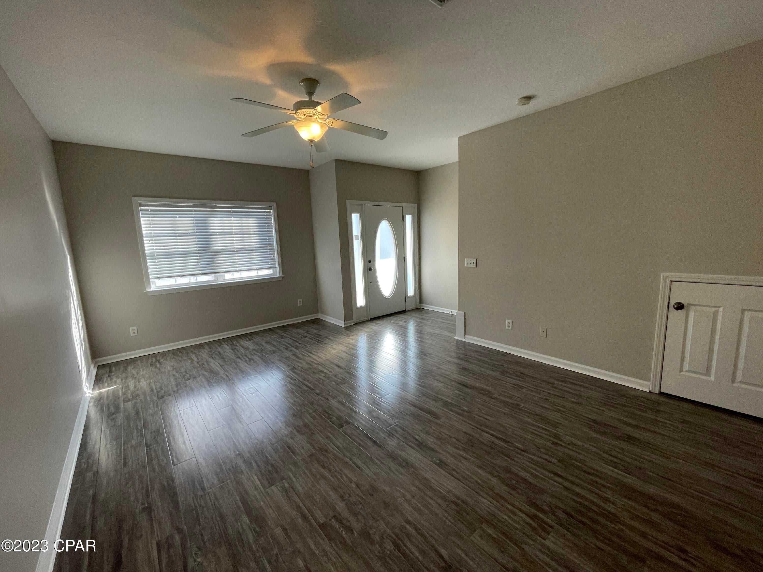2 BR|2.5 BA townhome located in the gated community of Annabella's with a community pool. The town home has an open floor plan with all living space downstairs. The kitchen features granite counters, stainless appliances and opens up to the dining/living room with vinyl plank flooring throughout the downstairs. There is a half bath and laundry closet with stacked washer/dryer included. Adjacent to the kitchen is a back door with outdoor deck. Upstairs are two master bedrooms, two bathrooms. The main master bedroom has en suite bathroom with double vanity and stand up shower. The second master has en suite bathroom with large vanity and tub/shower combination. This is a great townhome in the heart of Panama City Beach!