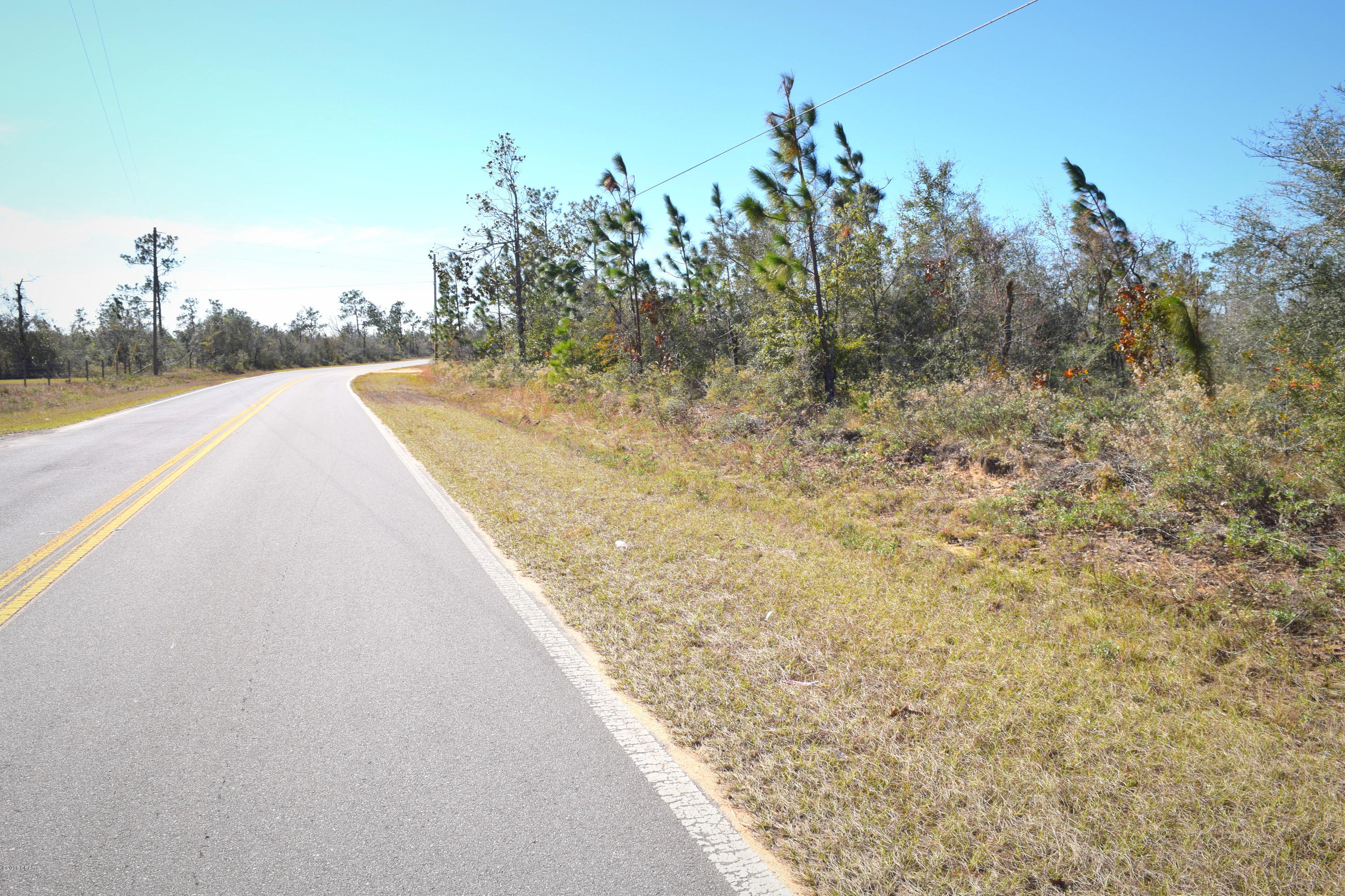 CURRENTLY UNDER CONTRACT, SELLER ACCEPTING BACKUP OFFERS. This 5.710 +/- acres of land has endless possibilities with plenty of privacy! Build your dream home or use for an investment property. Lot is mostly wooded and located on a paved road approximately 13 miles from Sunny Hills golf course, Boat Lake and fishing.