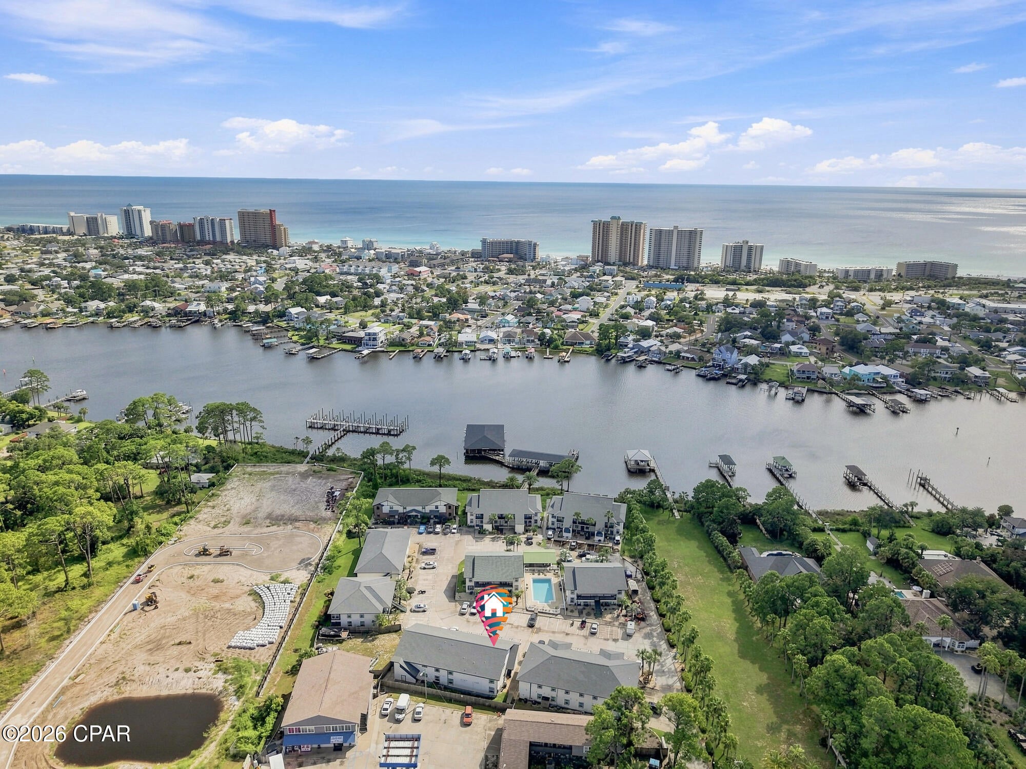 BOAT SLIP INCLUDED with this coastal living cozy condo 2-bedroom, 1-bath condo in Greenwood Estates, a peaceful waterfront community tucked along Panama City Beach's Grand Lagoon. With 720 square feet of thoughtfully designed living space, this charming second-floor residence is move-in ready and offers the added benefit of no neighbors above.

Inside, the light and inviting layout features a comfortable living area, two spacious bedrooms, and the convenience of laundry located right inside the unit. A dedicated exterior storage room provides additional space for beach chairs, fishing gear, paddleboards, and all the extras that come with enjoying life near the water.

Greenwood Estates offers a relaxed setting away from the busier tourist areas while keeping you close to everything Panama City Beach has to offer. Residents can enjoy a community pool, gated dock, and covered picnic and grilling pavilion overlooking the Grand Lagoon, an ideal setting for unwinding by the water, gathering with friends, or simply watching the boats pass by.

The location is exceptional for anyone who loves the coastal lifestyle. Boating, fishing, kayaking, and paddleboarding are right at your fingertips, while the sugar-white sands of Panama City Beach are approximately five minutes away. Popular local restaurants including The Grand Marlin, Capt. Anderson's, and Schooners are also just a short drive from home, along with nearby marinas, shopping, and entertainment.

Whether you're looking for a primary residence, a low-maintenance coastal getaway, or a long-term home near the water, this adorable condo offers an incredible opportunity to enjoy the Panama City Beach lifestyle in a quiet, established community.
Greenwood Estates is an owner-occupant and long-term rental community. Short-term and vacation rentals are not permitted. 

Schedule your private showing and come see what makes this waterfront community such a special place to call home!