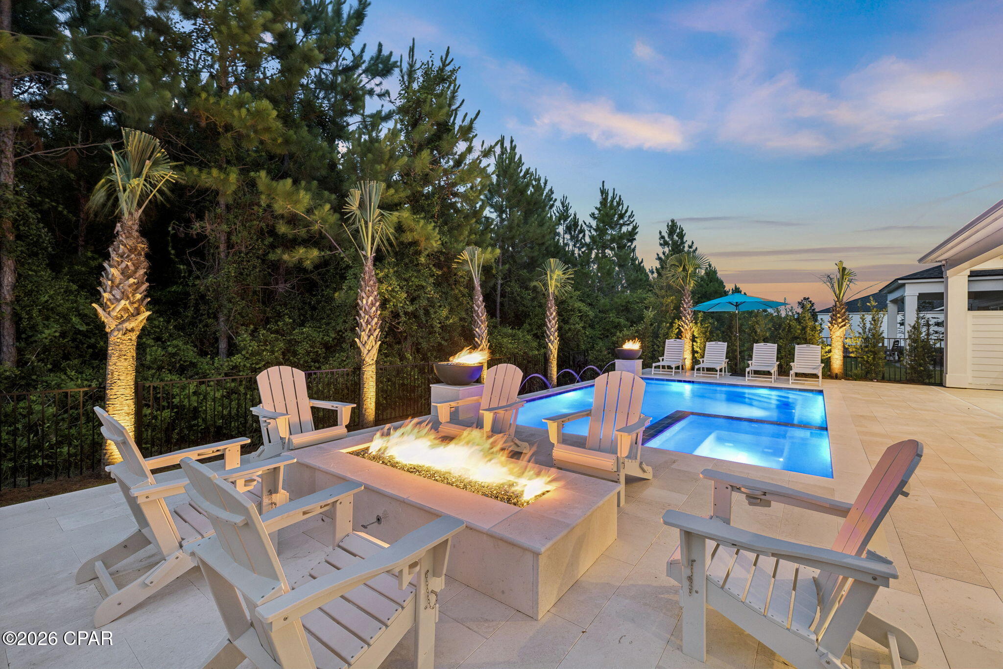 Seller will contribute up to $30,000 toward an interest-rate buydown or buyer closing costs with an acceptable offer! The most upgraded home to ever hit the market in Breakwater at Ward Creek. This 4-bedroom, 3.5-bath, 3,065 sq ft residence on a preserve-backing homesite has been finished years ahead of the standing inventory, with a level of detail that shows better than the model homes. Step into a two-story foyer with 20-foot ceilings, custom beam work, added window and door casing throughout, and a glass-enclosed wine cellar built under the stairs as an architectural feature. 

The kitchen carries KitchenAid appliances, a Thor cooktop, a custom wood vent hood with a top-tier exhaust system, marble counters that replaced all original quartz throughout the home, cabinet toppers, glass bar cabinetry, slide-out drawer systems, and full under- and in-cabinet lighting. The pantry was rebuilt into the largest available in a Toll Brothers floor plan, with custom shelving, marble counter, and a second LG refrigerator. 

Solid wood cabinetry was added in the mudroom, laundry, and primary bath, with new tile backsplashes, a shiplap accent wall, and gold fixtures and hardware carried through the home. Every closet is a custom build-out with drawers and shelving and dedicated lighting. 

The primary suite includes wireless motorized shades and a new dual shower with high-end tile and a custom waterfall design. Behind the home, a full front-and-back makeover delivers a saltwater pool and spa, fire pit with fire bowls, outdoor TV, landscape lighting, all backing to HOA preserve so the view stays yours.

A four-zone security camera system, whole-home WiFi coverage, custom tongue-and-groove porch ceilings, a fresh top-to-bottom interior repaint, and a three-car tandem garage with significant storage complete the home. This is not a project. It is move-in-ready luxury with nothing left to decide. Furniture negotiable.

Breakwater at Ward Creek is a gated community in one of Panama City Beach's strongest growth corridors. Its brand-new clubhouse just opened, with a fitness center, indoor and outdoor living spaces, a zero-entry pool with sun shelf and lap lane, cabana seating, a playground, tennis and pickleball courts, and a large outdoor green space. Nearby, the West Bay Town Center is bringing a new Publix and shopping, a new FSU Health hospital is underway, and a new Intracoastal marina is planned.