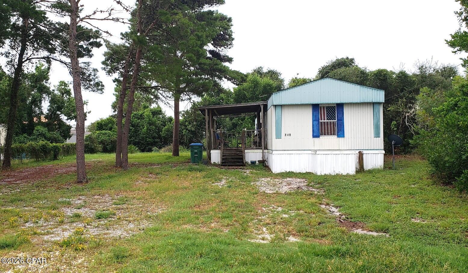 Great starter home, investment property or Beach retreat, located in the quiet Westwood Beach Estates neighborhood. This property is situated between the Gulf and Lake Powell. The home is in a very convenient location for anyone that works from Pier Park to the 30A area. With some maintenance and remodeling, this will be a wonderful home. Lake Powell has a boat launch and swimming area. Make an appointment to see this home.