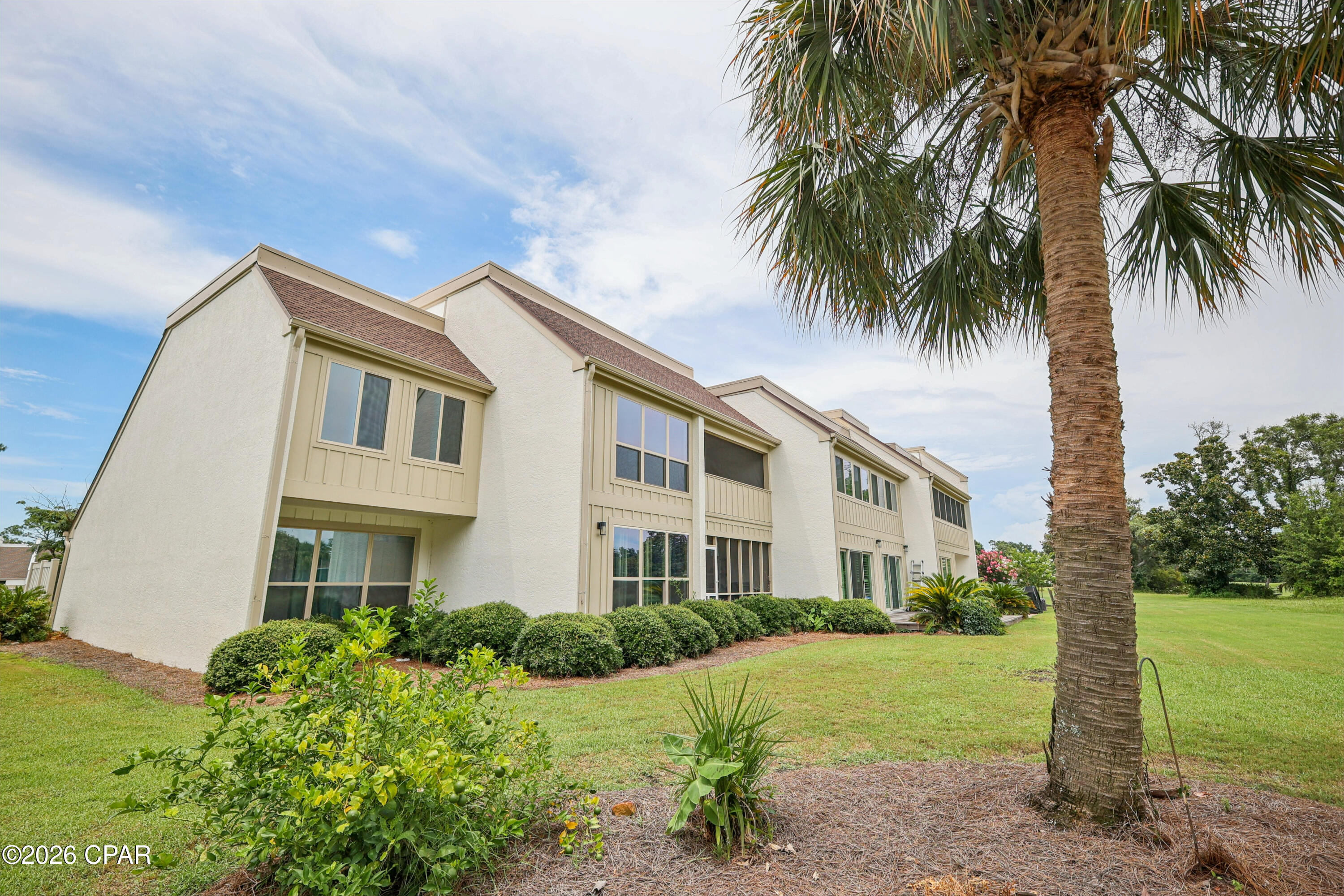 Golf Course Living in the Prestigious Bay Point Community
Experience resort-style living in this beautifully maintained two-story golf villa overlooking the 17th green of the Nicklaus Course in the highly sought-after Bay Point community. Offering 2 bedrooms, 2 full bathrooms, and approximately 1,300 square feet of heated and cooled living space, this home is the perfect opportunity for a primary residence, vacation getaway, or investment property.

Step inside to discover a bright and inviting floor plan featuring a spacious great room filled with natural light, creating the perfect space to relax or entertain after a day on the course or the water. Recent updates include a fresh coat of interior paint and brand-new carpet on the staircase, making this villa move-in ready.

The well-designed layout offers comfortable living with two generously sized bedrooms and two full bathrooms, while the covered balcony provides the ideal place to enjoy your morning coffee or unwind in the evening while taking in peaceful views of the beautifully manicured fairway and the 17th hole of the renowned Nicklaus Course.

Located behind the gates of Bay Point, residents enjoy the peace of mind of 24-hour gated security along with access to one of Panama City Beach's premier waterfront and golf communities. Bay Point is home to a world-class full-service marina, host of the prestigious Bay Point Billfish Tournament, and offers a vibrant lifestyle with community events, tennis courts, scenic walking paths, and easy access to boating, fishing, golf, and the Gulf of Mexico.

Property Highlights: 2 Bedrooms | 2 Full Bathrooms, Approximately 1,300 Sq. Ft,Two-story golf villa ,Overlooks the 17th green of the Nicklaus Course ,Spacious great room ,Fresh interior paint, Brand-new carpet on the stairs, Covered balcony with beautiful golf course views, Located in a 24-hour gated community, Full-service marina hosting the Bay Point Billfish Tournament, Tennis courts, community events, and resort-style amenities, Minutes from beaches, dining, shopping, and marina, and just a short drive to the beaches and popular dining.