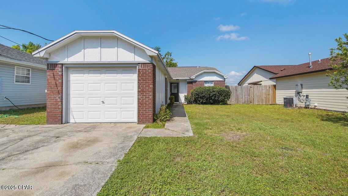 Charming 3BR 2BA home centrally located in Panama City and just minutes to Panama City Beach. HVAC, Roof & Privacy fence all new and updated in 2019. This home offers solar panels so you'll enjoy a low electric bill as well as zero HOA fees.  As you walk in you'll see the kitchen to your left with a large dining area just off of the kitchen. The living room is open and large with plenty of room for entertaining.  The home has tile and wood flooring throughout so no hassle with carpet. The bedrooms are spacious and the main bedroom has an attached bath that offers a shower/tub combo. The backyard is huge  and is fully fenced with privacy fencing. This home is a must see and with some TLC has a lot to offer.