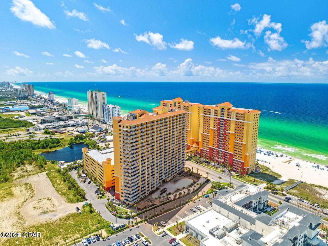INTERIOR PICTURE COMING SOON!

Unbelievable Price on this truly Unique unit in Calypso Tower 3!  Only one stack in the entire tower offers this incredible floor plan.  Unit 3-2112!
Welcome to Calypso Tower 3!
Stunning in every way, from its ideal floor height to its designer interior and extraordinary wraparound balcony, this unit delivers truly unmatched panoramic views. Enjoy unobstructed vistas of the Gulf, Pier Park, and the dazzling city lights, all complemented by breathtaking sunsets.
Located in Panama City Beach, a destination now gaining national recognition as it evolves from its former spring break reputation into a premier family-friendly luxury market, this property places you at the center of it all.
A rare coastal oasis featuring one of the most exclusive floor plans in the building. This is the only 3-bedroom, 3-bath end unit per floor, with just 22 units of this kind in the entire tower-making it truly one of a kind. Whether you're seeking a private retreat or a high-performing vacation rental, this residence offers exceptional versatility.
Spanning approximately 2,117 square feet, this unit is highlighted by an expansive 609-square-foot wraparound balcony-perfect for entertaining or simply taking in sweeping views from every angle. The Gulf-front primary suite offers a luxurious escape, complete with a spa-inspired bathroom featuring a large walk-in shower with dual shower heads.
From day to night, enjoy spectacular scenery including the illuminated Pier Park, the iconic Ferris wheel, and seasonal fireworks displays (weather permitting),
all from the comfort of your private balcony.
Professionally furnished and thoughtfully upgraded throughout, this unit is more than just a condo-it's a statement of refined beachfront living. From the moment you enter, the quality and attention to detail are undeniable.
Enjoy an impressive collection of resort-style amenities, including a lagoon-style pool, hot tub, well-appointed fitness center, on-site dining with al fresco seating, and direct beach access-offering a true luxury lifestyle just steps from the sand.
Don't miss this rare opportunity to own one of the most distinctive and sought-after units in Panama City Beach. Schedule your private showing today and experience elevated coastal living at its finest.