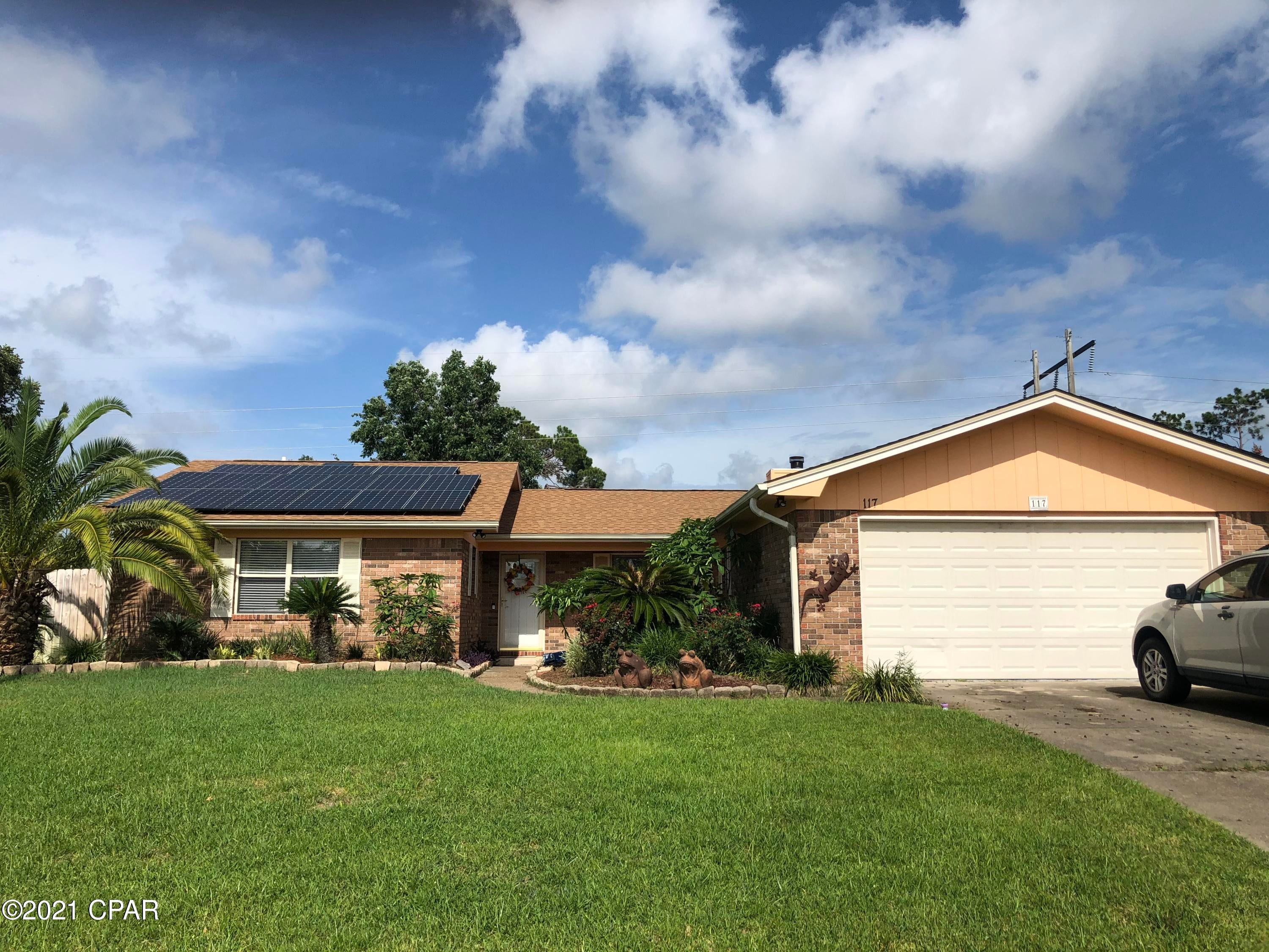 3/2 beautifully renovated all brick home in Candlewick Acres on a large lot with lovely landscaping is now available!  New roof & skylights in 2019.  Solar panels installed in 2020. New HVAC & water heater in 2020.  Granite countertops in kitchen and both bathrooms. Tile floors throughout the home with wood look & ceramic tile in kitchen/breakfast room area. No carpet in the home! Custom tile showers in both bathrooms.  Master bath has soaking tub with jets. Home has a 240 sf Florida room just off the LR. Irrigation system with separate well.  Candlewick Acres in the Northshore community of Panama City is a very sought after location in Central Bay County with close proximity to everything! Come see this beautiful home today!