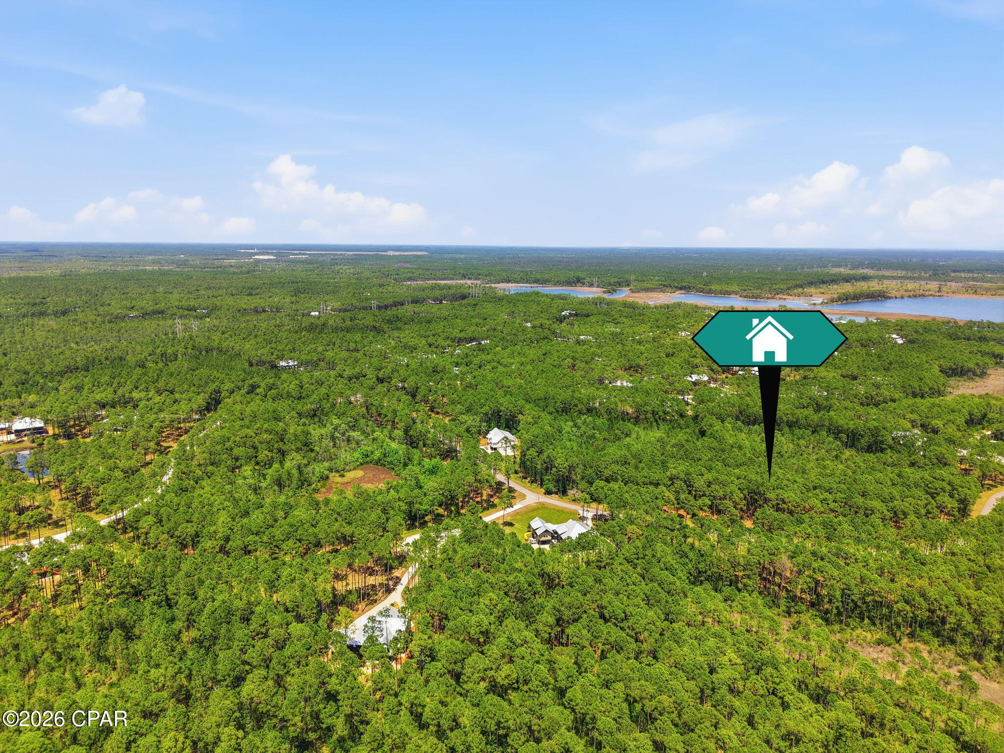 Welcome to an exceptional opportunity in the gated waterfront community of RiverCamps. This vacant lot is the perfect canvas to build your custom dream home in a setting defined by natural beauty and coastal tranquility. Positioned among preserved conservation land and scenic marsh surroundings, this homesite provides a peaceful, private atmosphere with frequent wildlife sightings and stunning natural views. Grab a bike or put on some sneakers and head over to the miles of trails that run parallel to the bay, just minutes from this lot. RiverCamps is renowned for its exceptional amenities, including a pool overlooking the bay, boat ramp and storage, day-use boat slips, and future fitness center. Residents enjoy direct access to Crooked Creek, West Bay, and the Intracoastal Waterway, all ideal for boating, fishing, kayaking, and exploring the natural beauty of the Florida Panhandle. Conveniently located near the best of Panama City Beach: new hospital, shopping at Pier Park, dining, a 10 minute drive to the beach, and less than 30 minutes to 30A. Select your own builder and customize your dream home on your own terms. Builder plans and Survey available upon request.