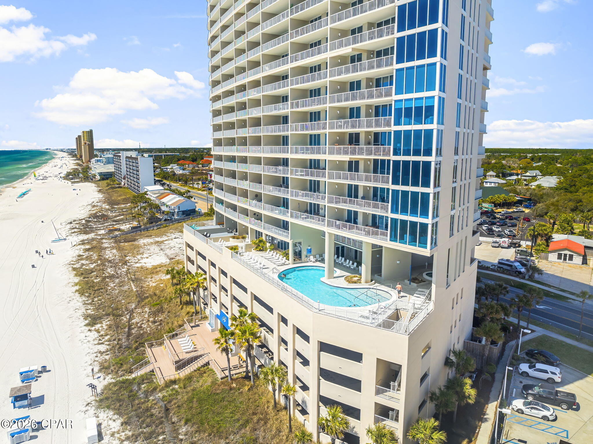 Price Reduced!!  Step into Palazzo Unit 806 to enjoy one of the best values on the beach.  This 2 bed/2 bath condo ALSO has a bunk room AND an additional Climate-Controlled Storage Unit... perfect for all of your personal beach gear.  Comfortably sleeping 8 and outfitted in classic beach style, this condo is perfect for your family vacation or as a short-term rental.  Your kitchen is outfitted in all stainless steel appliances and granite counters.  The Master Suite and Living Area both open onto your spacious balcony.  Perfect for treks around town, 2 Townie bicycles are included as well as a lime green kayak.  The Palazzo, built in 2008, offers resort style amenities including a state-of-the-art fitness center, under building parking, heated pool, hot tub, grilling and picnic areas, coded garage access with on-site building security, and owner pet walking area.  Major building updates completed within the past 4 years include--with no special assessments--full exterior painting, new deck with beach access, pool and lobby area retiling, balcony resurfacing, and parking garage fire suppression replacement.  The 2026 HOA fees have not risen in 3 years.