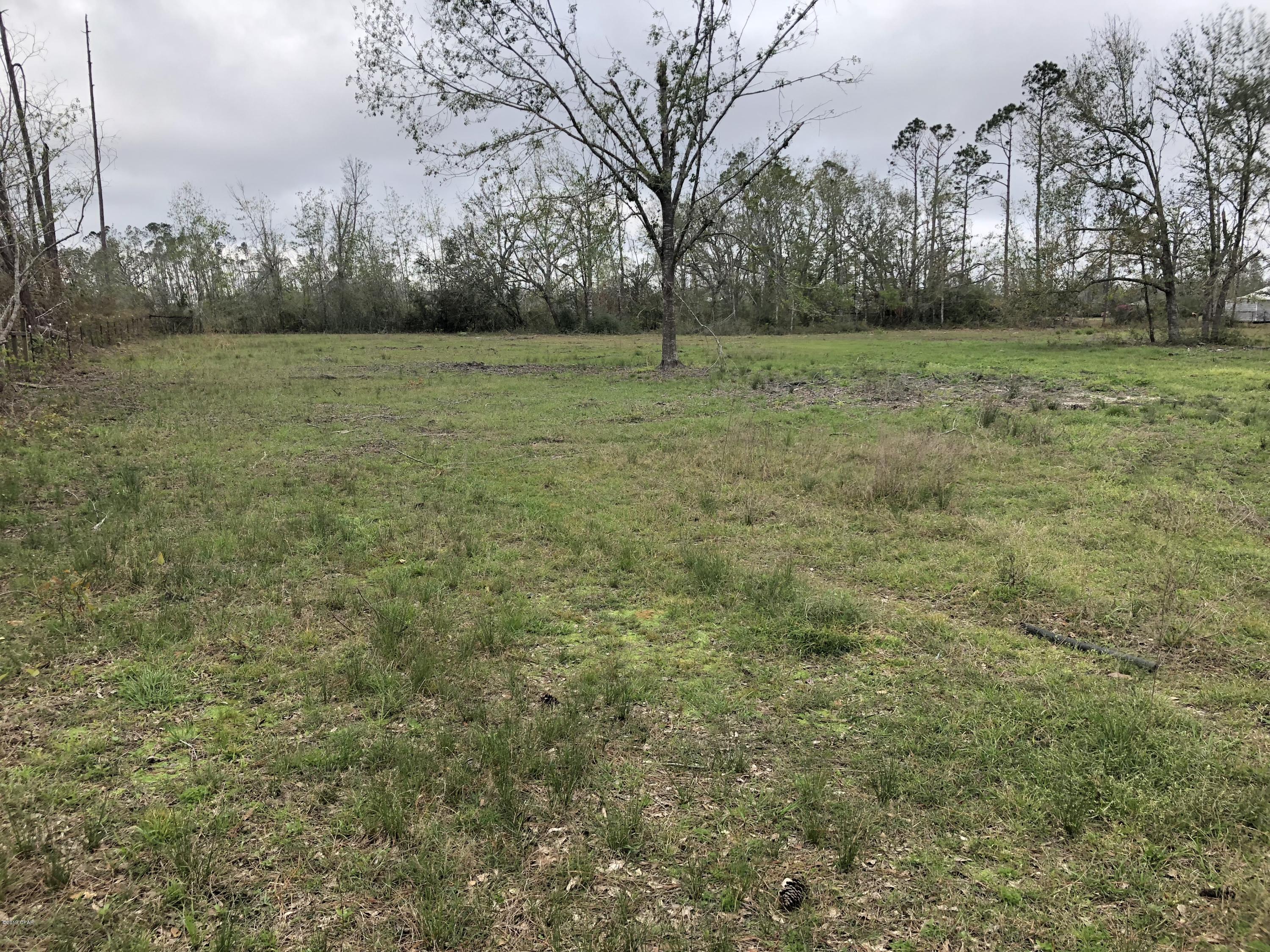 Perfect location to build your dream home and bring your animals. Property has a small horse barn and wire perimeter fencing. It is conveniently located only a few miles from Deer Point Lake. On the front part of the property is a well, septic tank, and electric.