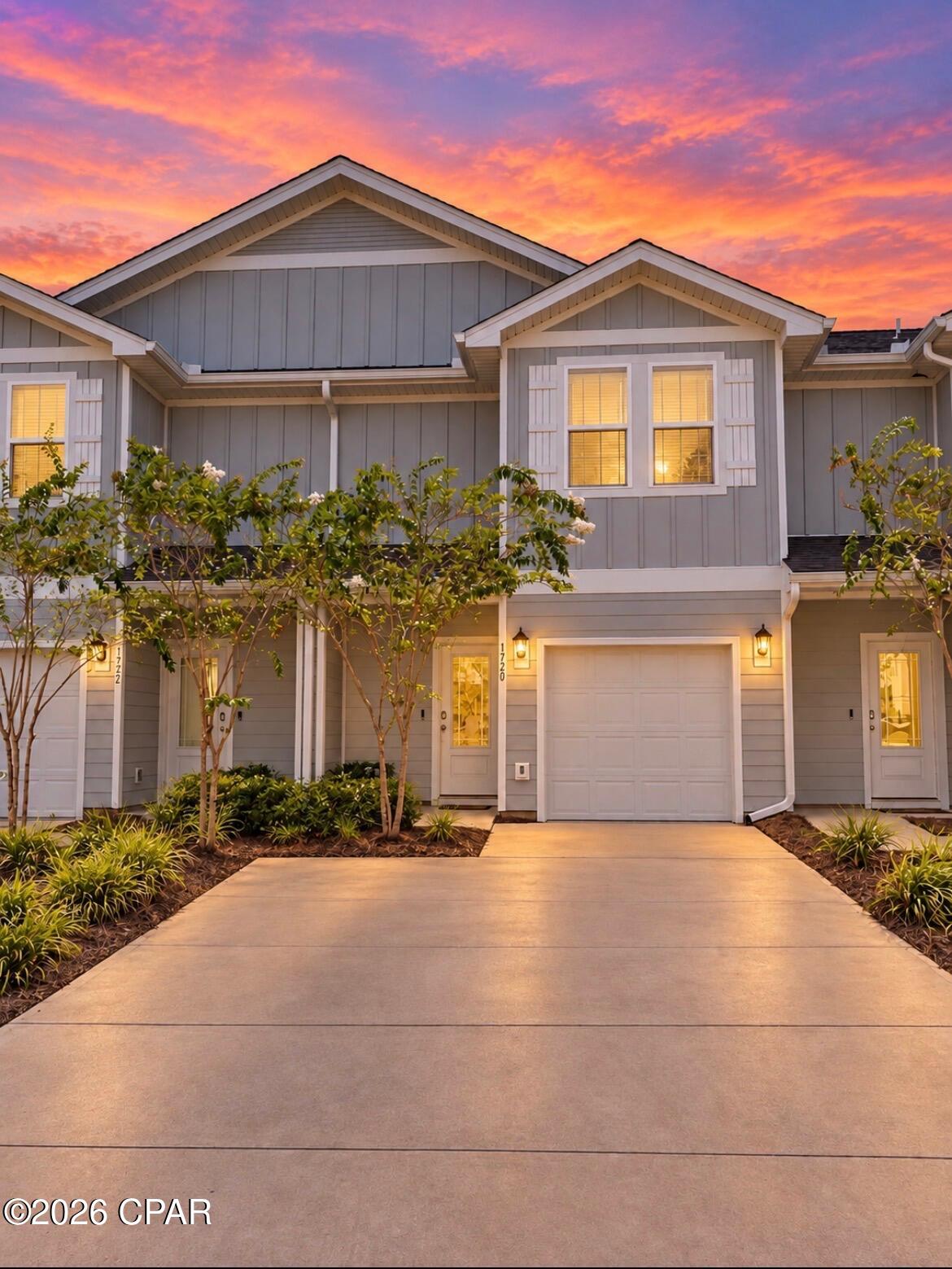 Welcome to low-maintenance living at its finest in the desirable Jakes Landing neighborhood! This stunning, modern townhome offers a bright, open-concept floor plan designed for effortless everyday living and entertainment. The main level seamlessly connects the spacious living and dining areas to a chef-inspired kitchen featuring granite countertops, stainless steel appliances, crisp cabinetry, and a large island perfect for prep or breakfast seating.

Upstairs, the expansive primary suite serves as a private retreat complete with an ensuite bath and generous closet space, while the additional bedrooms offer versatility for family, guests, or a home office.  Conveniently located near the Hwy 77/390 corridor, you're just minutes from top-rated schools, dining, shopping, major employers, Tyndall AFB, and the white-sand beaches of Panama City Beach. Schedule your private showing today!