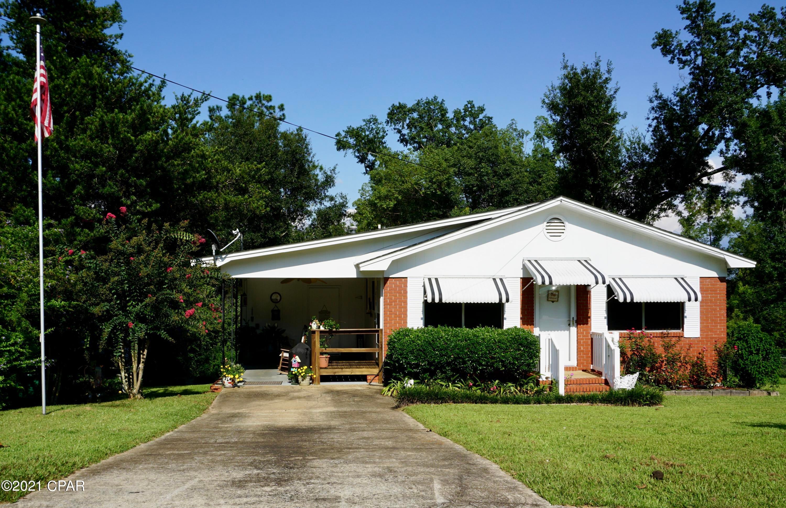 Wonderful starter or retirement home in Chattahoochee, Florida.  Located on a large lot on quiet Morgan Avenue, this home features 2 bedrooms and  1.5 baths (1/2 bath is an ensuite to the primary bedroom). Full bath has been renovated. Home is brick on all sides. Roof and several windows have been recently replaced and storm doors installed. Home is wired for a generator in the case of power outages. Large yard has been lovingly landscaped and includes an outdoor shed and carport. This home is a short 45 minute drive to Tallahassee and is within minutes of beautiful Lake Seminole and the Apalachicola River. Chattahoochee is a Main Street community currently enjoying a cultural Renaissance! This is the perfect place to start a family or live out the golden years! INTERIOR PHOTOS TO COME!