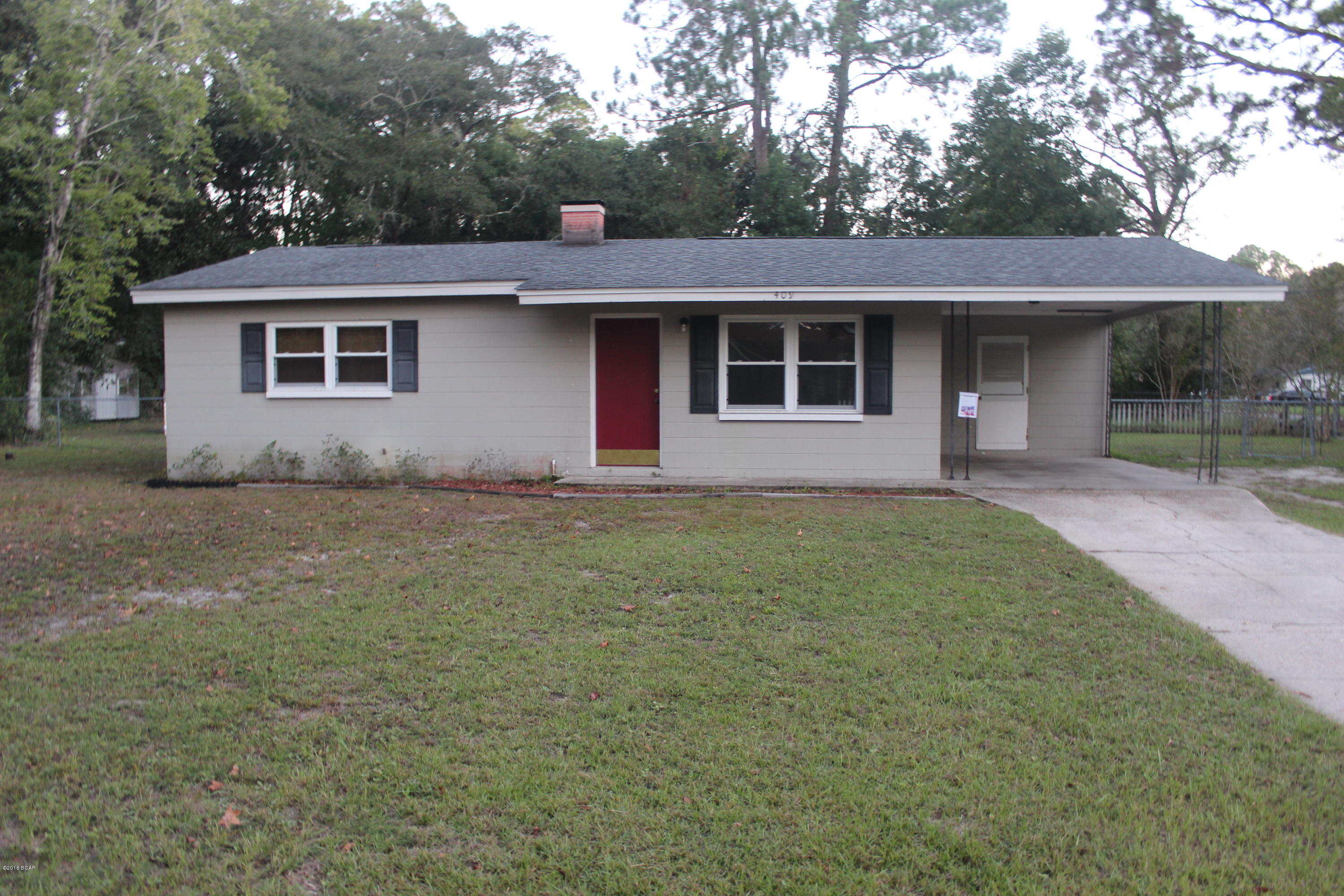 Solid block home with newer roof, windows and wood laminate flooring.  Spacious rooms with remodeled kitchen.  Lot is 1/2 acre fenced.  Pets welcome.