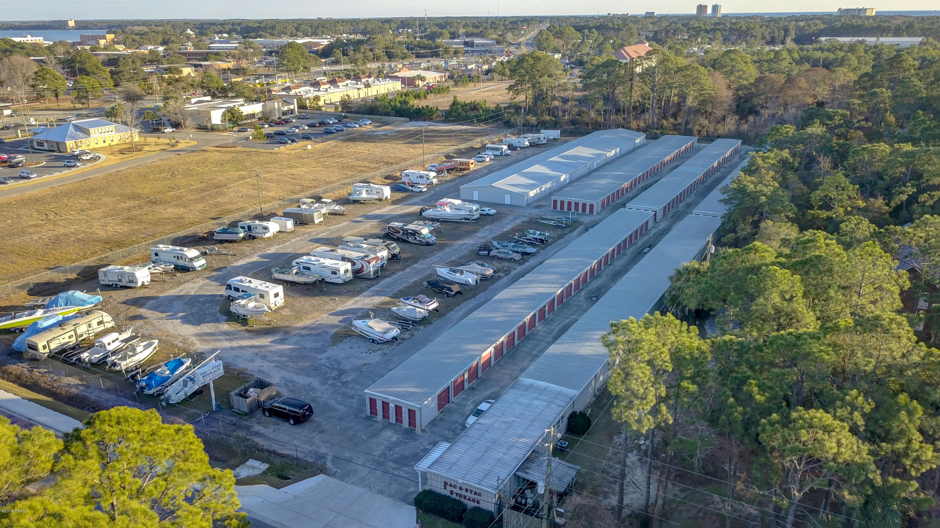 Pac and Stac Storage is a established income producing property located on Panama City Beach, Florida. The property consists of +/- 4.3 acres of land and 44,056SF of climate-controlled and non climate-controlled drive up storage with a average occupancy rate of 93%. There are a total of 407 rent able units and RV/boat storage. The facility is made up of 4 buildings built in 1997,1999 and 2005 and includes a office and 2 bedroom apartment for a live in property manager. There is a long term reliable property manager that would be a asset to a absentee owner or someone looking for a passive income investment. The property is located just off Thomas Drive which is a main thoroughfare for Panama City Beach.