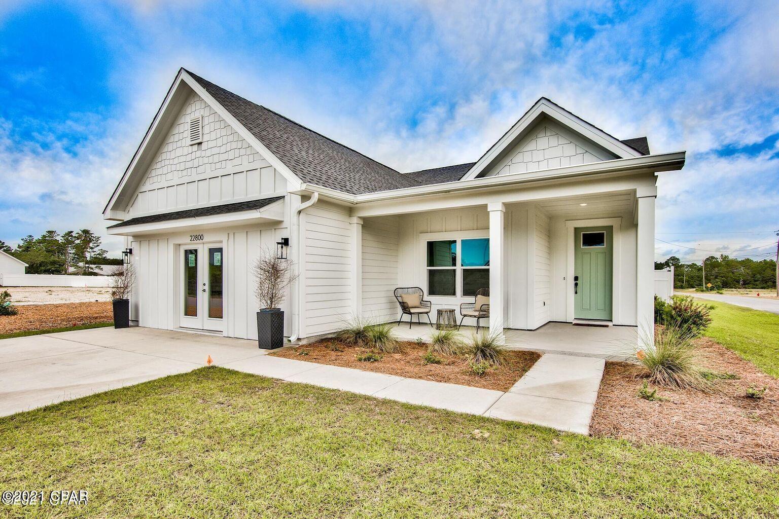 Enjoy the Inlet Beach lifestyle for a fraction of the price! The Preserve at Lake Powell is a coastal community located on the west end of Panama City Beach. We have 40 new lot/home packages to choose from and 4 floor plans. This premier development is only a short drive to the largest public beach access in Walton County, the public boat launch at Lake Powell Park, 30 Avenue for shopping & entertainment, Camp Helen State Park, and Rosemary or Alys Beach. Coastal style homes featuring quality materials, bold features, and versatile design are the centerpiece of this serene residential retreat. This Grouper floor plan features 4 bedrooms (option for a fourth bedroom & full bath in lieu of a study & half bath), 3 baths, 2,015 sq ft, 2-car garage, and 2 covered porches. *Photos are of the model home (Grouper floor plan) and are being shown to give a representation of the finishes used within the community.* Standard features include scratch resistant laminate hardwood flooring, cabinets with soft close doors & drawers, granite countertops (can upgrade to Quartz), and more. Upon entry you are welcomed into the foyer which leads directly to the kitchen and open living & dining areas. Several windows bring in lots of natural light giving the space a great ambiance.

The kitchen features a large center island with breakfast bar, stainless steel appliances, cabinets with soft close doors & drawers, granite countertops & backsplash, and a separate pantry. There is an option to upgrade to the gourmet kitchen.

The spacious master suite features a luxurious en-suite master bath with double vanities, walk-in tile shower, oversized walk-in-closet, and a separate water closet. In lieu of a study, you can opt for a fourth bedroom located just off the foyer at the front of the home.

This is your opportunity to own a brand new coastal home located in the heart of what makes the Emerald Coast famous. The Preserve at Lake Powell is ideally located with quick and easy access to outdoor activities such as biking, hiking, kayaking, paddle boarding, boating, and fun beach days. There are currently homes under construction and several available lots. Choose your lot and the features/options of your Grouper floor plan today! Full packages are available upon request. We look forward to helping you find an amazing property with a million dollar lifestyle at a fraction of the price!

**Pricing is subject to change based on additional upgrades being added during the construction process.**
The kitchen features a large center island with breakfast bar, stainless steel appliances, cabinets with soft close doors & drawers, granite countertops & backsplash, and a separate pantry. There is an option to upgrade to the gourmet kitchen.

The spacious master suite features a walk-in closet and a luxurious en-suite master bath with double vanities, walk-in tile shower, and a separate water closet. The split bedroom floor plan places the two additional bedrooms at the front of the home giving the master extra privacy. Additional bedrooms are generous in size and share a bathroom.

This is your opportunity to own a brand new coastal home located in the heart of what makes the Emerald Coast famous. The Preserve at Lake Powell is ideally located with quick and easy access to outdoor activities such as biking, hiking, kayaking, paddle boarding, boating, and fun beach days. There are currently homes under construction and several available lots. Choose your lot and the features/options of your Flounder floor plan today! Full packages are available upon request. We look forward to helping you find an amazing property with a million dollar lifestyle at a fraction of the price!

**Pricing is subject to change based on additional upgrades being added during the construction process.**