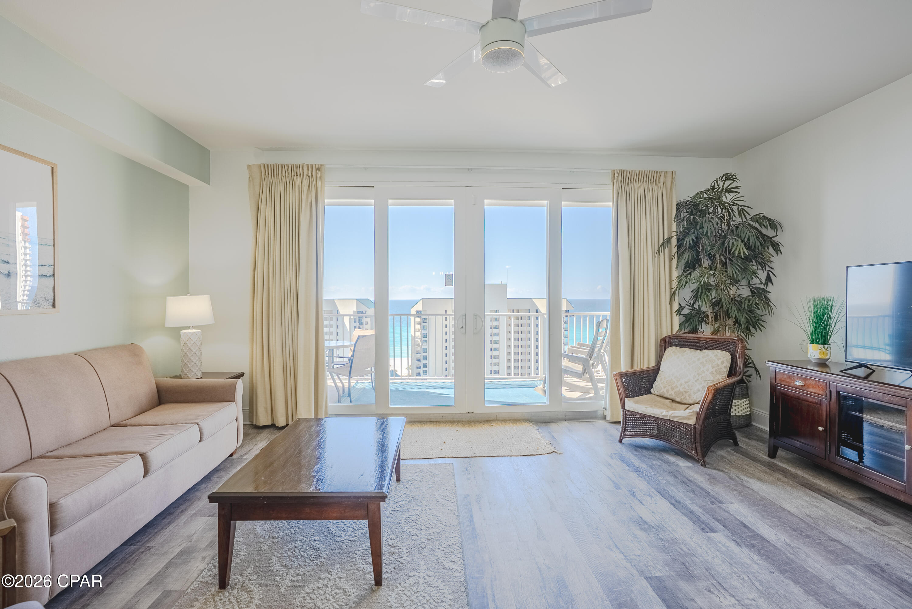 Welcome to Unit 1116 at Laketown Wharf, where resort-style living meets incredible views and endless amenities! Located on the prime 11th floor, this beautifully laid-out condo offers 1,047 square feet of open and spacious living, designed for comfort and relaxation. Step out onto the large private balcony and take in stunning views of the Gulf, perfect for morning coffee or evening sunsets.

The open layout of the kitchen & living area is perfect for entertaining! It is bright and airy with tons of natural light pouring in from the large sliding doors to the Gulf-facing balcony. You will find tile & LVP flooring throughout the unit. No carpet = easy upkeep! The condo includes a private master en-suite and a versatile bunk room with its own bathroom. It can sleep 6 guests comfortably. This condo is perfect for a primary residence or short term rental.

Laketown Wharf is known for its impressive resort amenities, including five unique swimming pools, a state-of-the-art fitness center, a poolside bar, waterfront dining, and a nightly fountain light show that creates a fun and lively atmosphere. Guests also enjoy gated beach access for easy trips to the sugar-white sand and emerald waters.

The location is hard to beat, directly across the street from the famous Pineapple Willy's and convenient to shopping, dining, and entertainment. The commercial level under the building features restaurants, shops, and a bowling alley, making it easy to enjoy everything Panama City Beach has to offer without ever leaving the property.

Whether you are searching for a vacation getaway or a strong short-term rental investment, this darling condo offers stunning views, excellent amenities, and a prime beachside location. Come see it today!