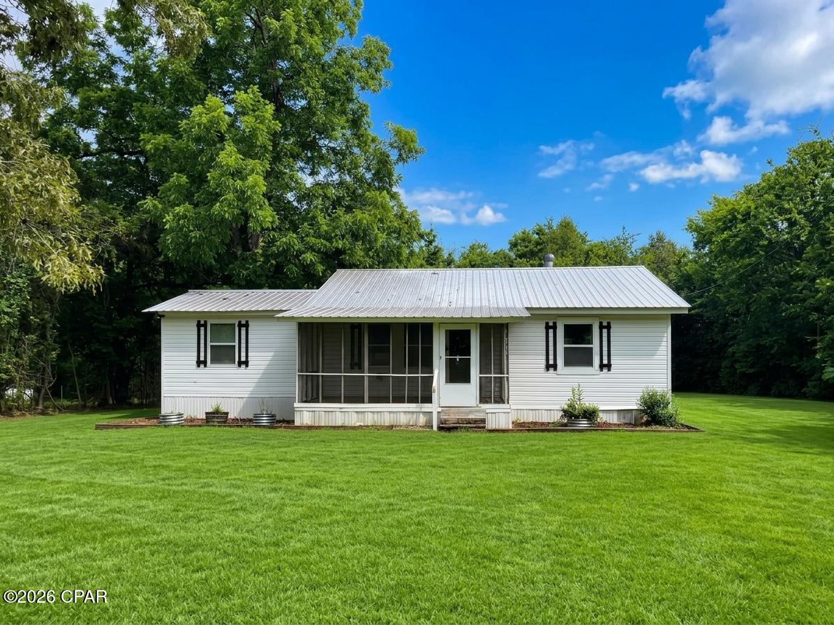 Welcome to country living at its finest! This 3-bedroom, 2-bath home is located on a quiet country road in Grand Ridge, offering the peaceful setting buyers are looking for while still being conveniently located just minutes from I-10 and approximately 2 miles from Grand Ridge School. The home features major updates including a metal roof and HVAC system, both installed in 2022, as well as a water heater replaced in 2023, providing peace of mind for years to come. The seller also has a survey available to provide.

Whether you're searching for your first home, looking to downsize, or simply wanting to enjoy a slower pace of life, this property offers the perfect blend of comfort, convenience, and country charm. Enjoy room to spread out, relax, and make this house your own. Don't miss this great opportunity to own an affordable home in a desirable rural setting!